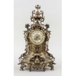 historicist mantel clock, 2nd half of 19th c., bronzed brass, decorated with floral elements and