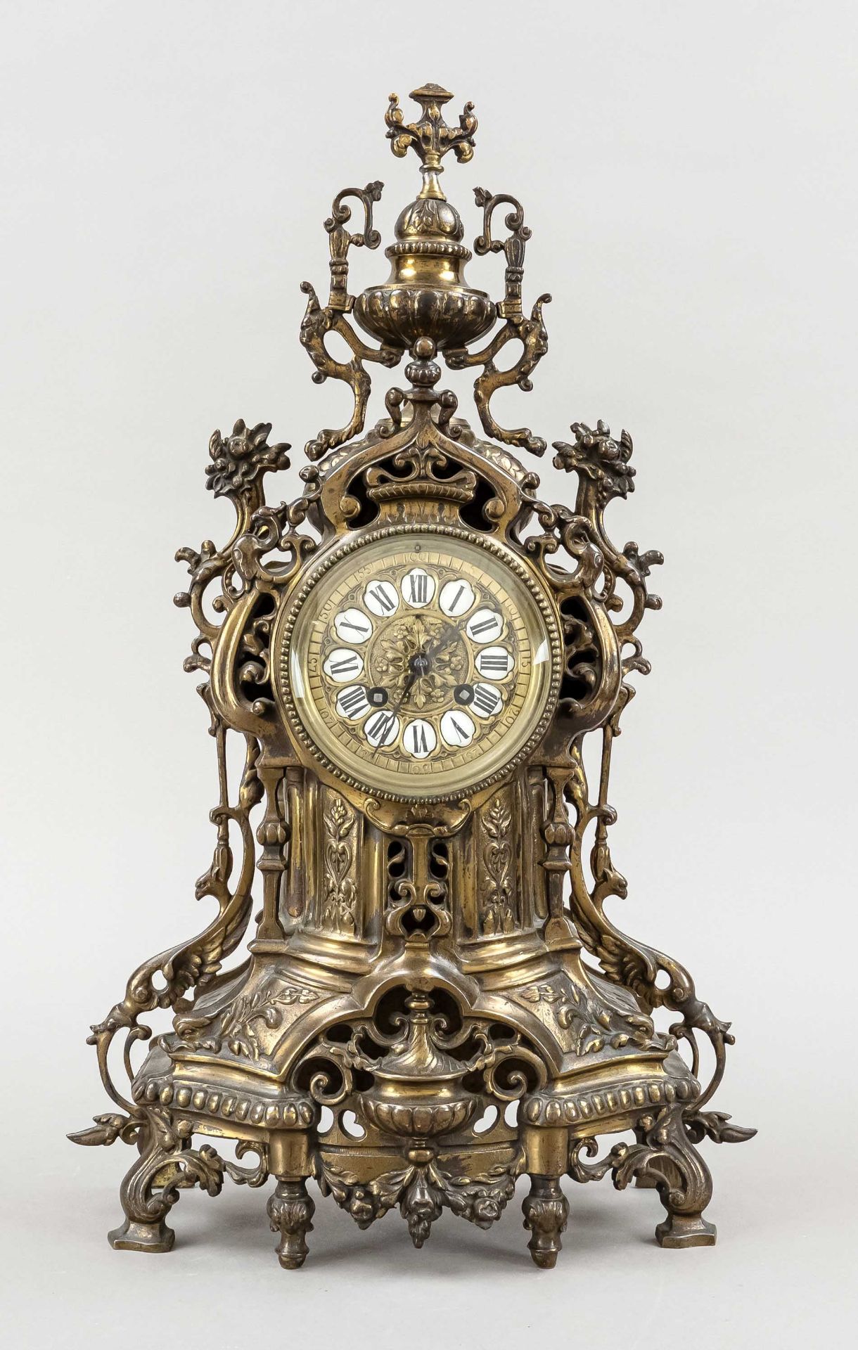 historicist mantel clock, 2nd half of 19th c., bronzed brass, decorated with floral elements and