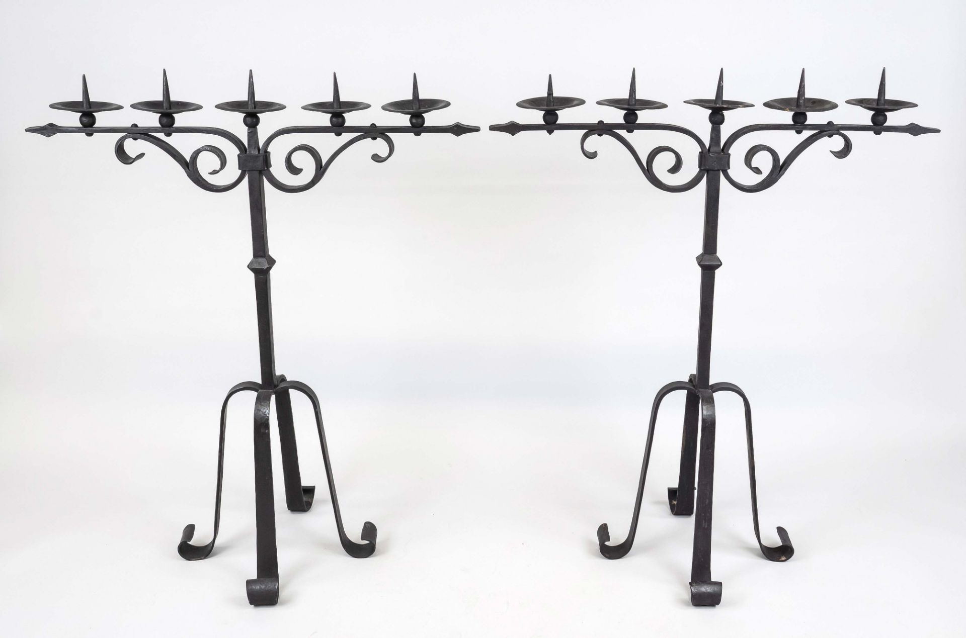Pair of large wrought iron candlesticks, 19th/20th c. Square shaft with nodus on 4 high curved