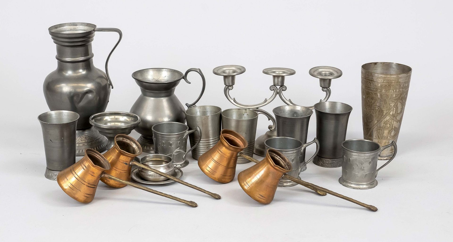 Pewter set (15 pieces), 19th/20th c., and 4 copper mocha pots with long handles, h. to 23 cm