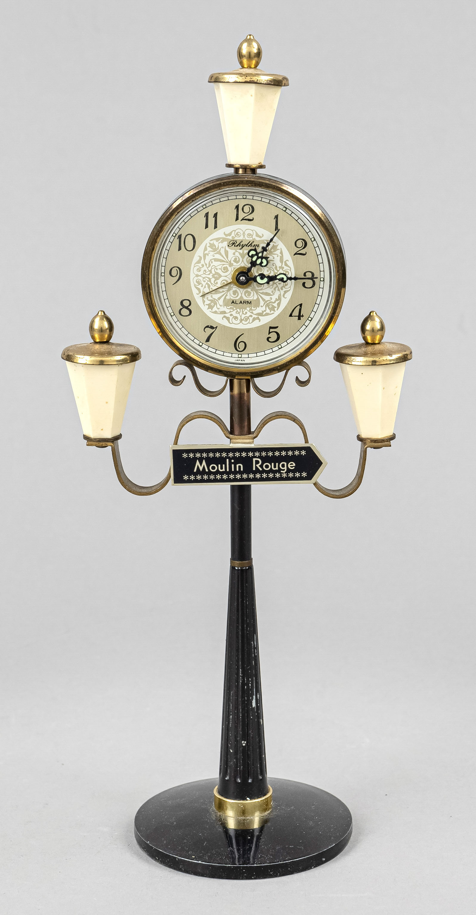 Table clock travel alarm clock, in the shape of a lantern, black base with gilded decorative