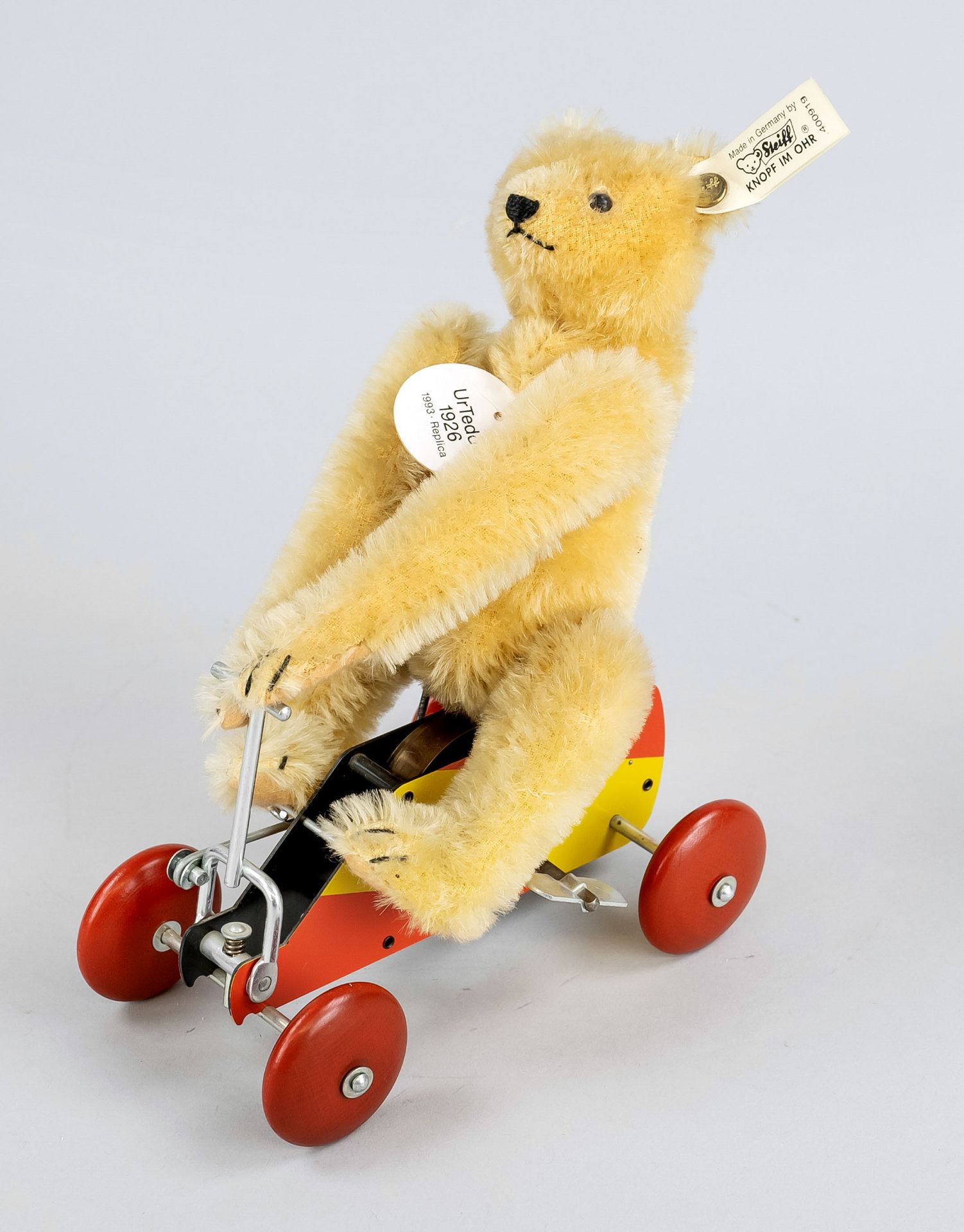 UrTeddy 1926 (1993 replica), made in Germany. Sitting on running wheel with mechanical elevator (