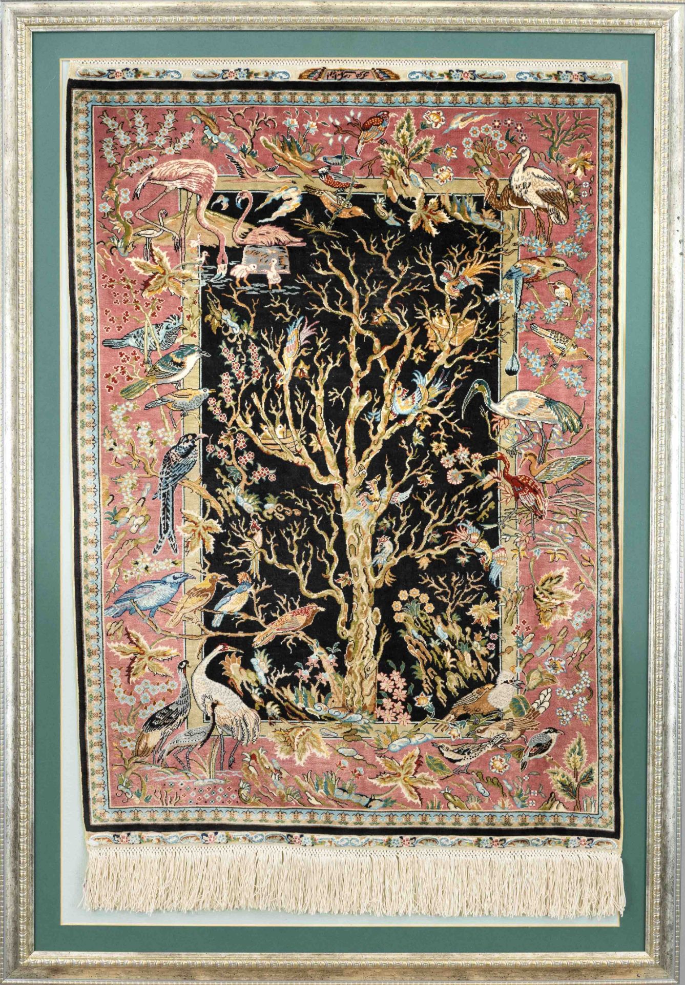 Silk carpet, Turkey (Hereke), mid 20th century, tree of life against black background, signed,