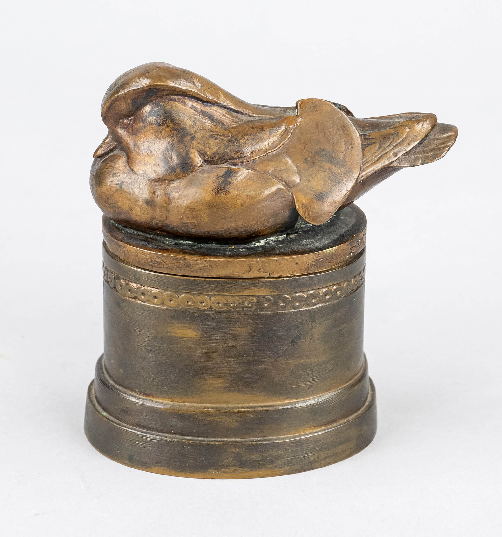 Bronze box with sculptural mandarin duck, around 1920, the oval base as a box with a loose plug