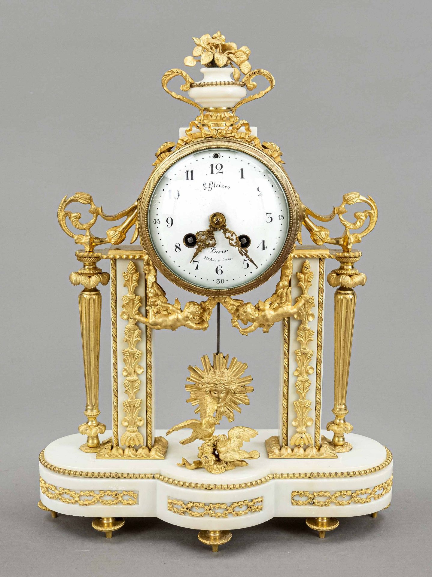 french. Pendule Louis Seize, 2nd half 19th c., fire gilded, white curved marble base and columns,