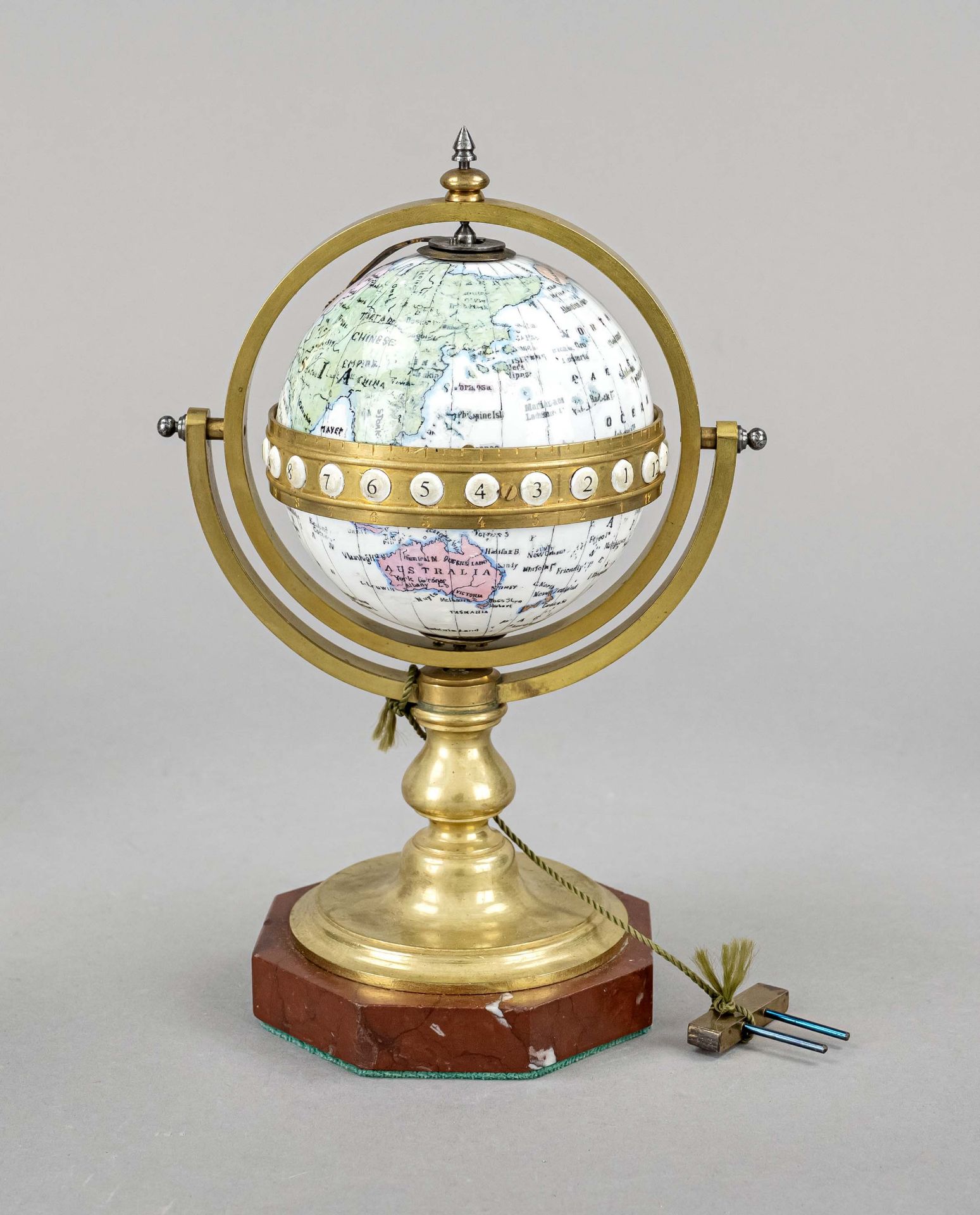 Table clock globe, probably early 19th century, polychrome enamel globe, gimbaled in brass mount,