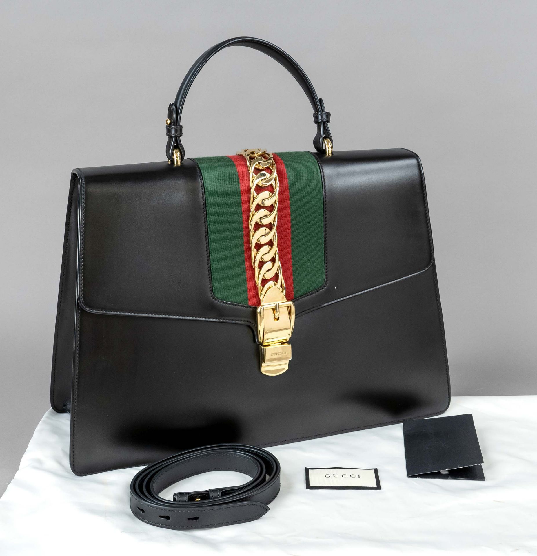 Gucci, Black Maxi Sylvie Top Handle Bag, black calfskin, gold-tone hardware, short central handle,