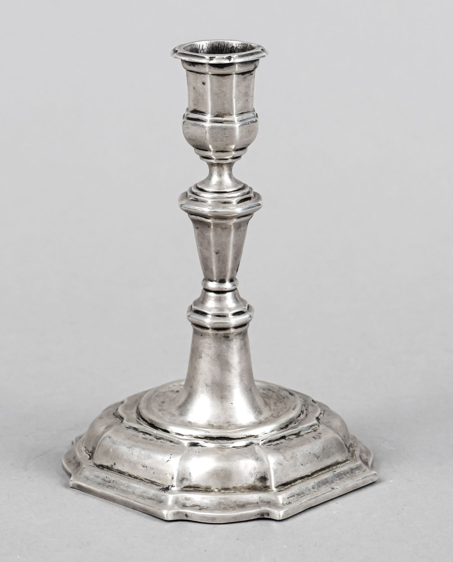 Baroque style candlestick, probably German, 19th c., chased hallmarks, square stand with matching