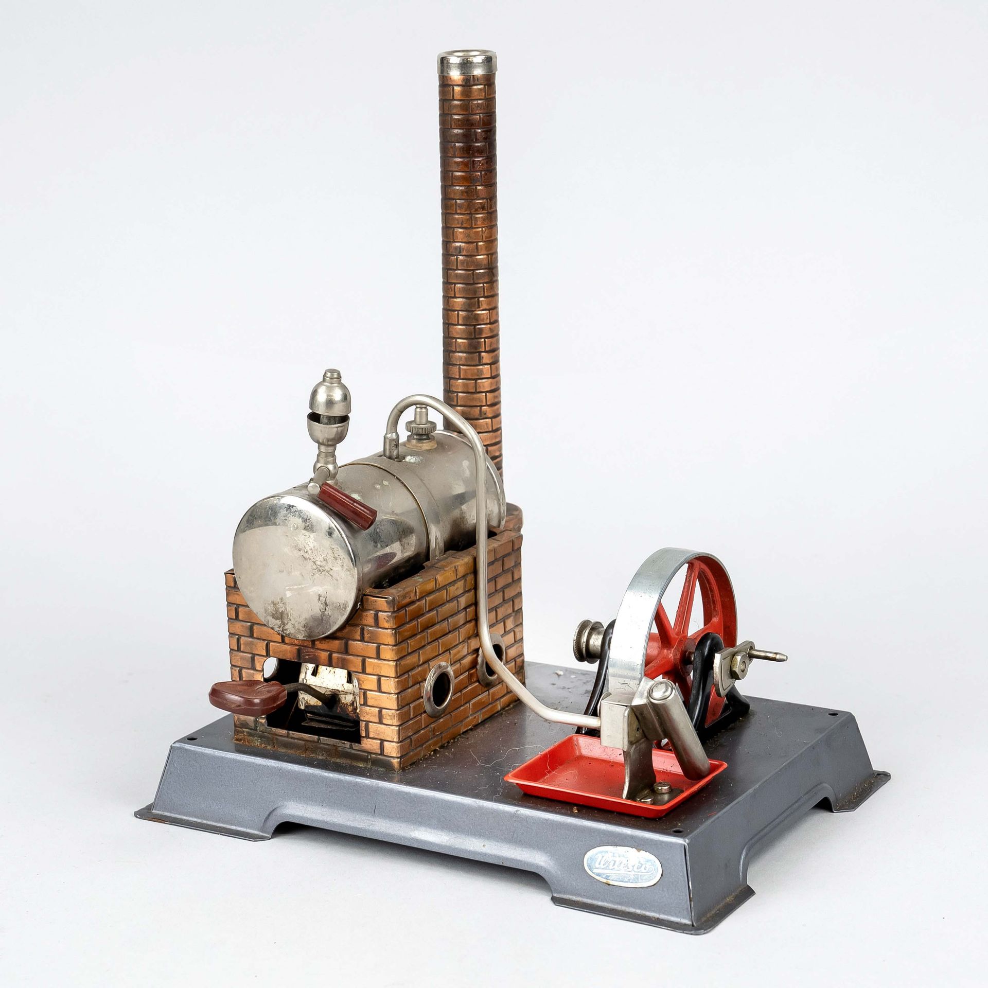 Steam engine by Wilesco, Germany, 2nd half of 20th c. Platform with boiler, flywheel and chimney