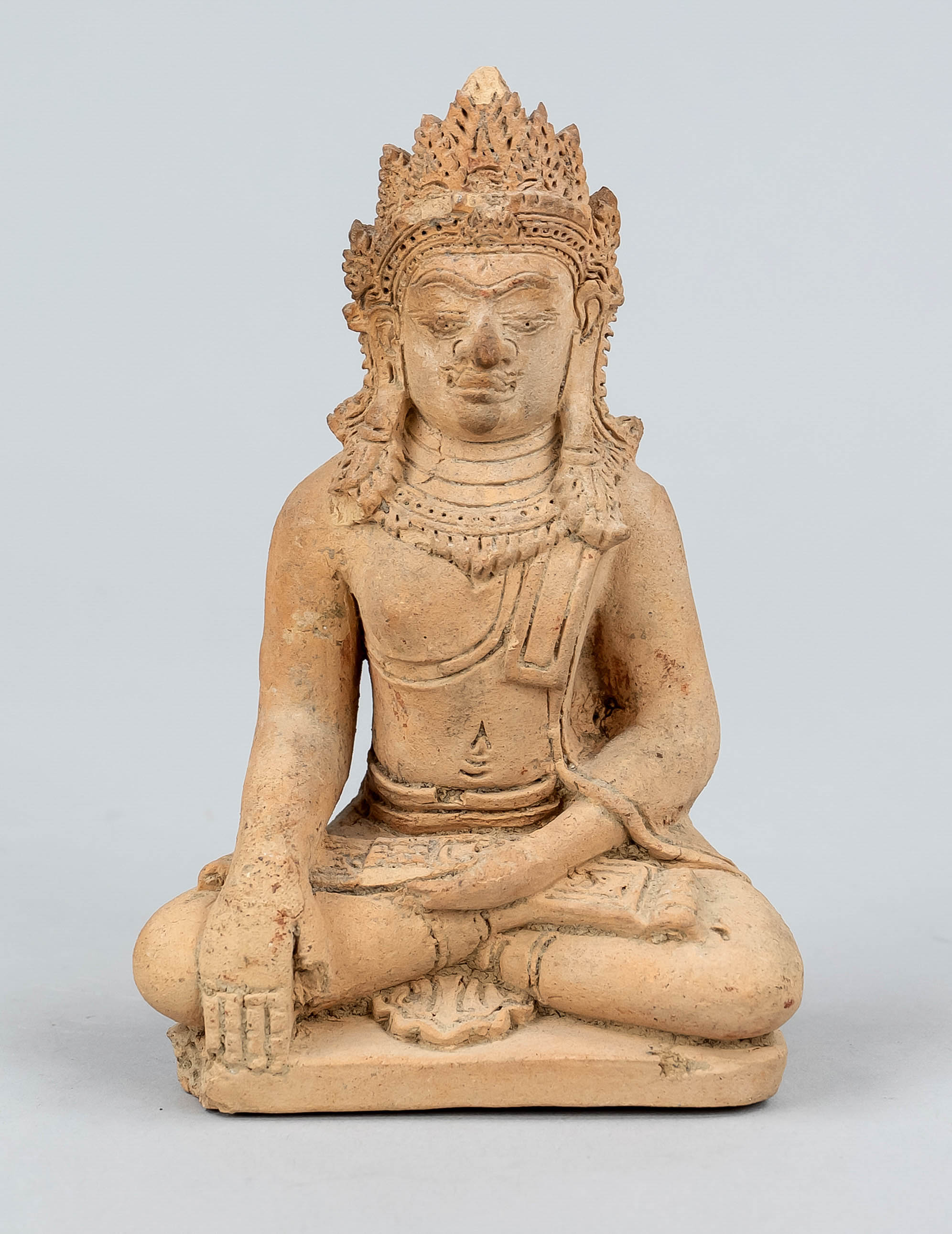 Clay Buddha, Tibet, probably 19th c., the crowned Siddharta Gautama in lotus seat(skrt.