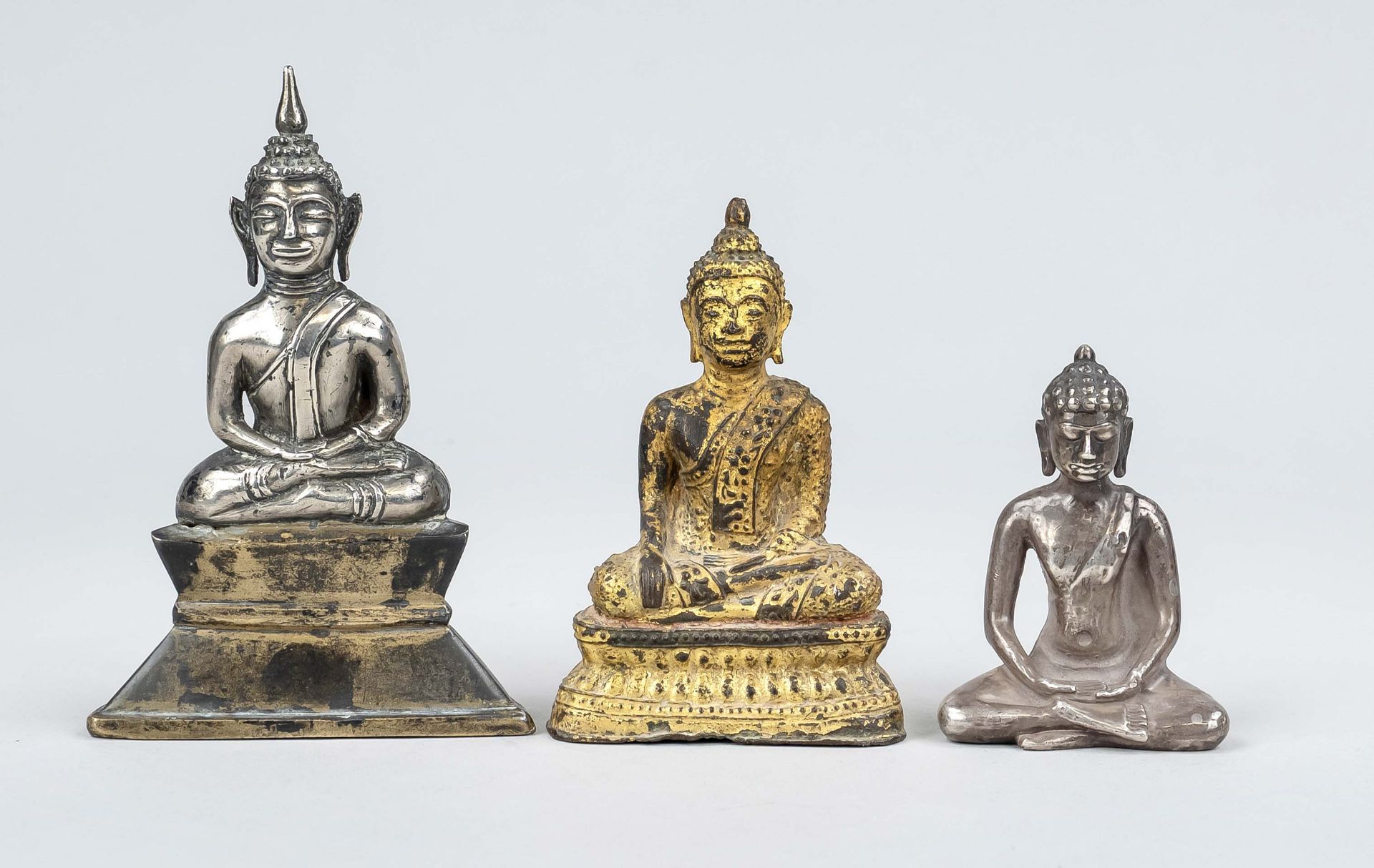 3xBuddha Shakyamuni, Thailand, 19th c., silver tested and bronze(aggravated), gold color setting,