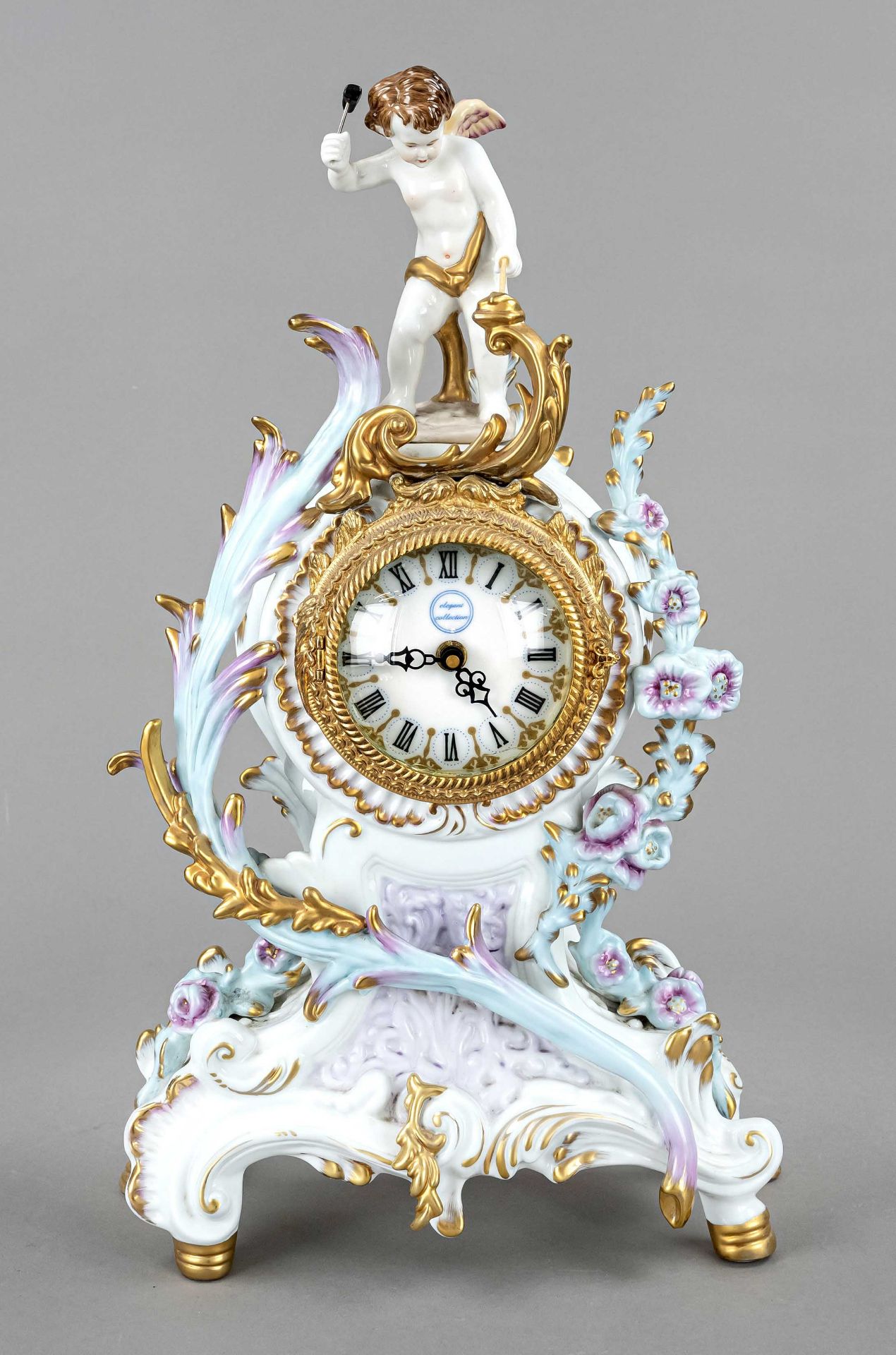 Porcelain clock with armor forging luck, marked elegant Collection, 2nd half 20th century, basic