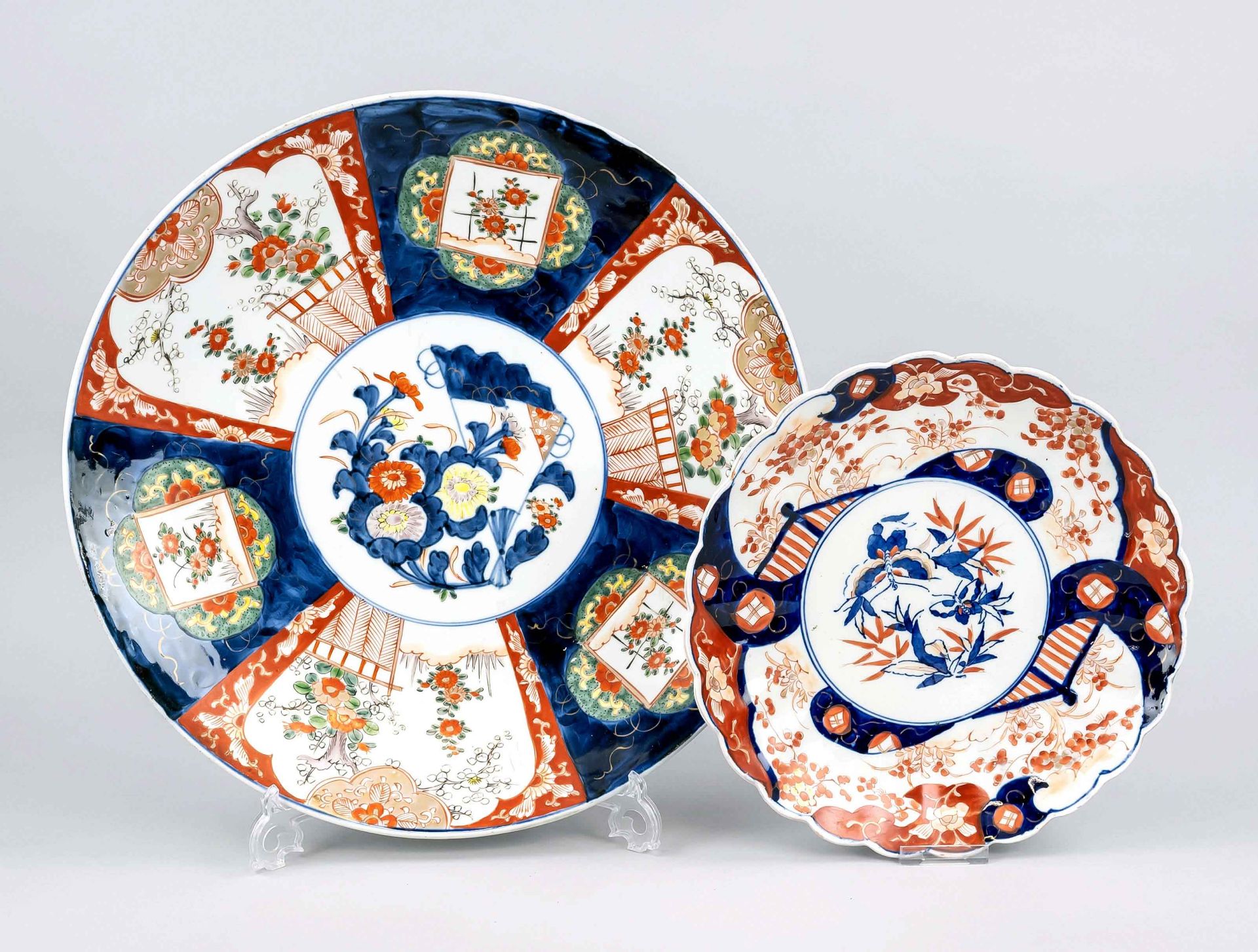 2 Imari plates, Japan, around 1900, porcelain with polychrome glaze colors, chrysanthemums and