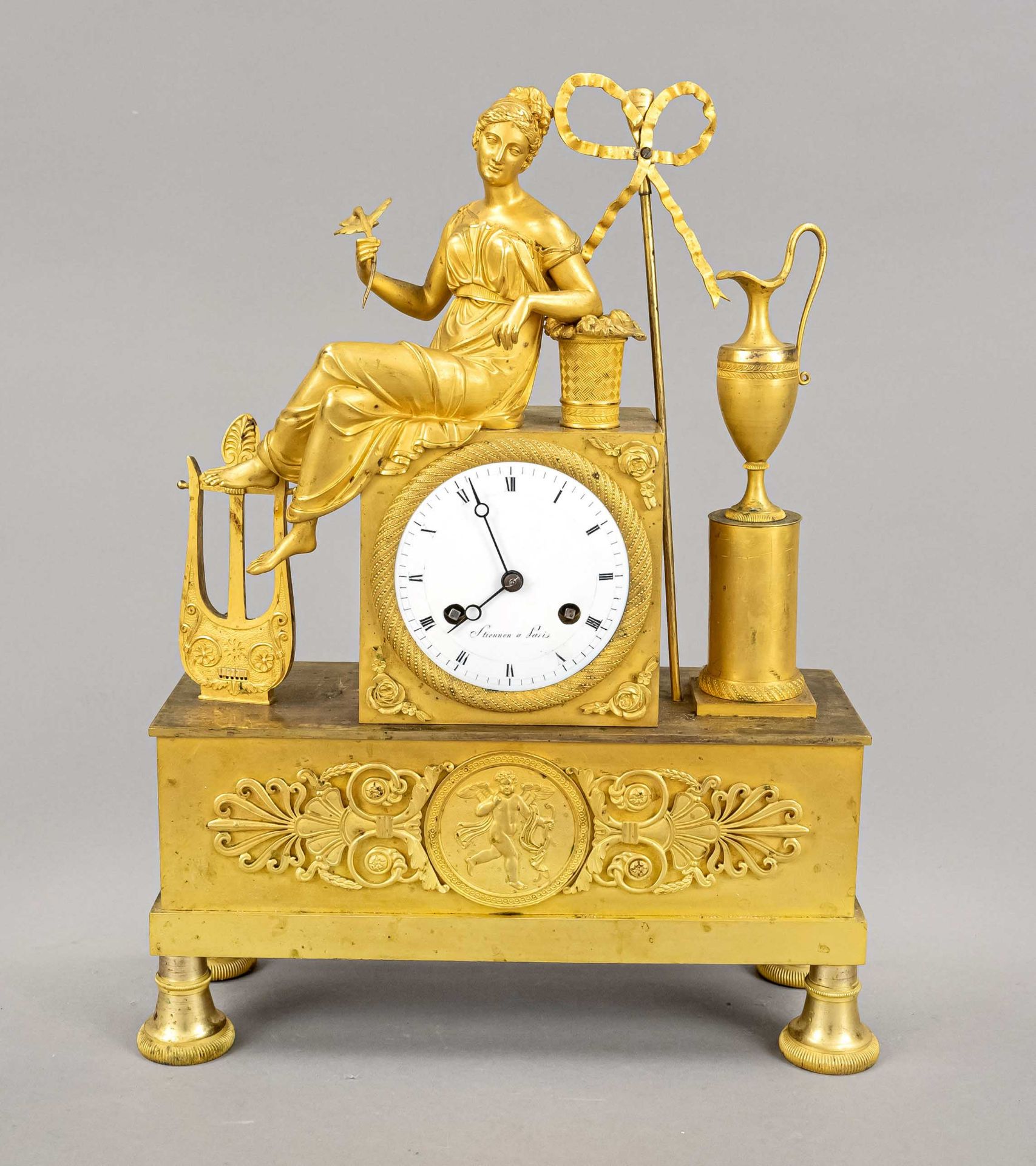 french. Empire figural pendulum, 1st half 19th c., marked Stiennon a Paris, fire gilded, in the base