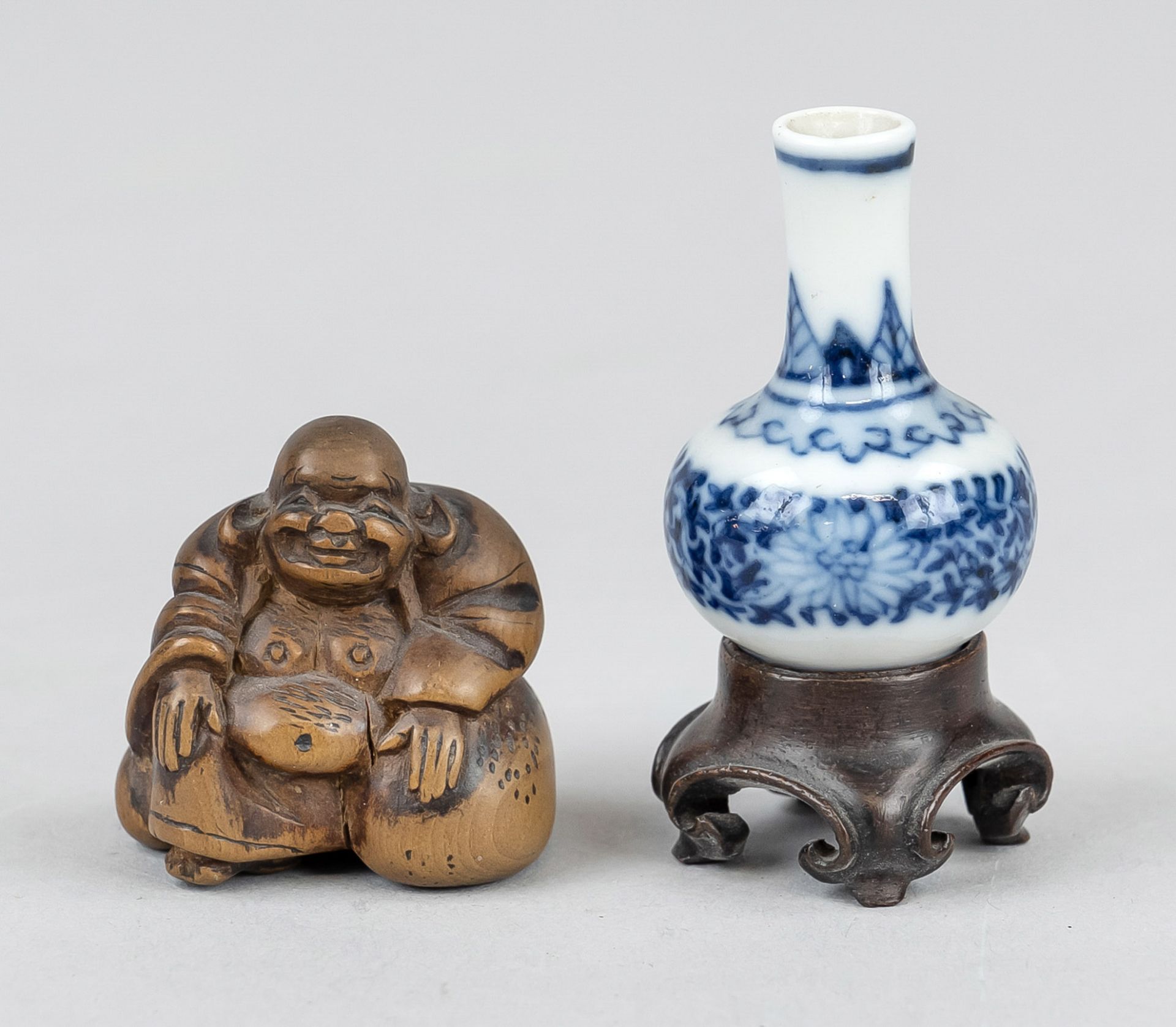 Netsuke Budai and miniature vase, China/Japan, c. 1900, thick-bellied Buddha of carved boxwood and
