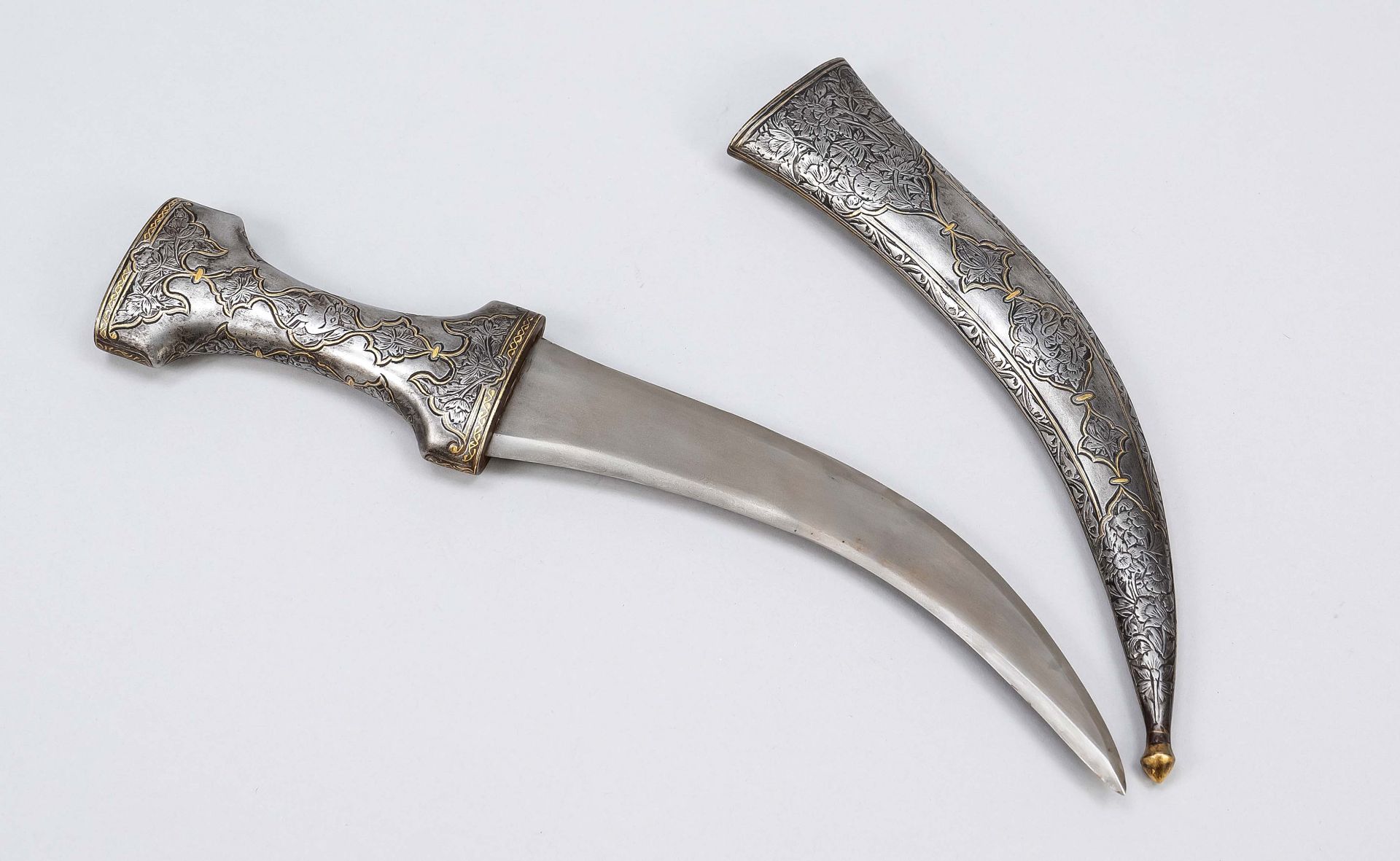 Oriental dagger Djambia, 19th c. Iron handle and scabbard with wooden core, decoration in iron cut