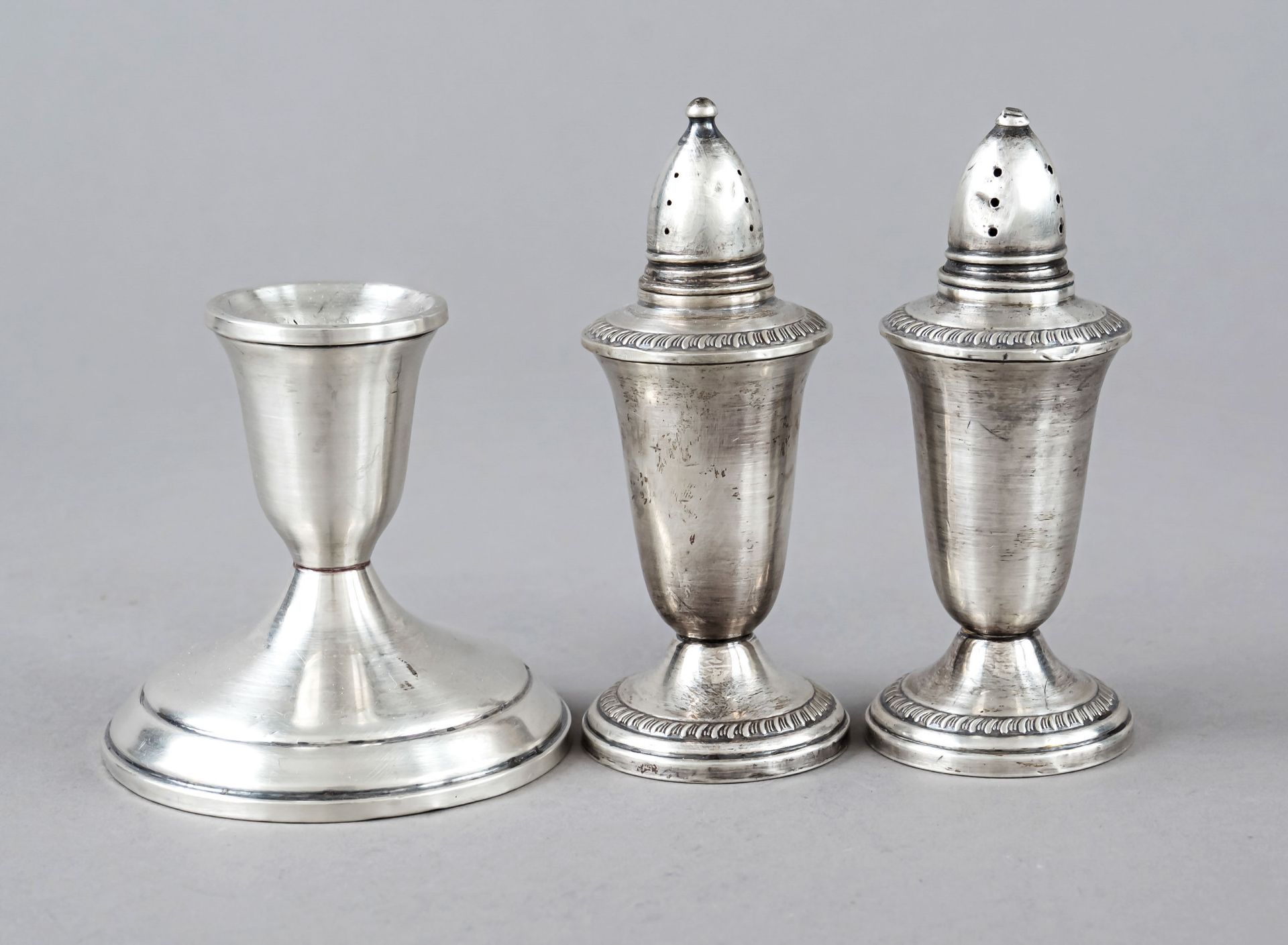 Candlestick and salt and pepper shaker, USA, 20th century, sterling silver 925/000, each with