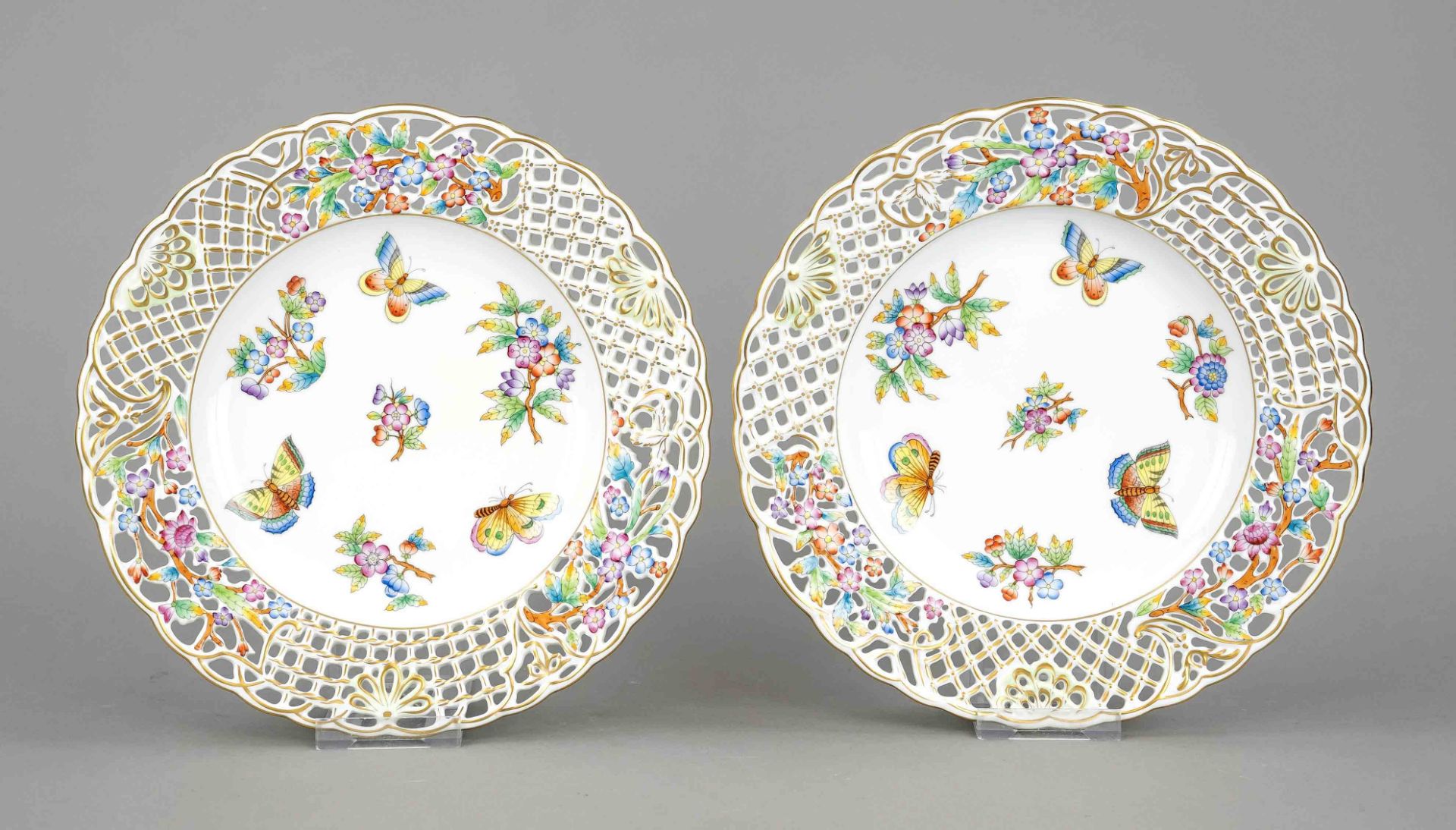 Pair of breakthrough plates, Herend, Hungary, 20th century, curved form, openwork flag with