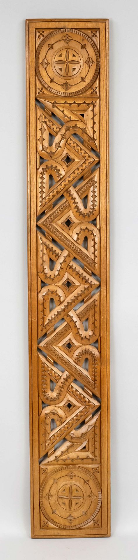 Carved panel, 20th c., light hardwood, open worked as geometric braided band with applied thorn