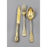 Dinner set, around 1900, silver 800/000, gilded, rounded handles with engraved decoration and