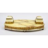 Desk attachment, late 19th c., onyx corpus on 6 ball feet, gilded relief bath with vine leaves