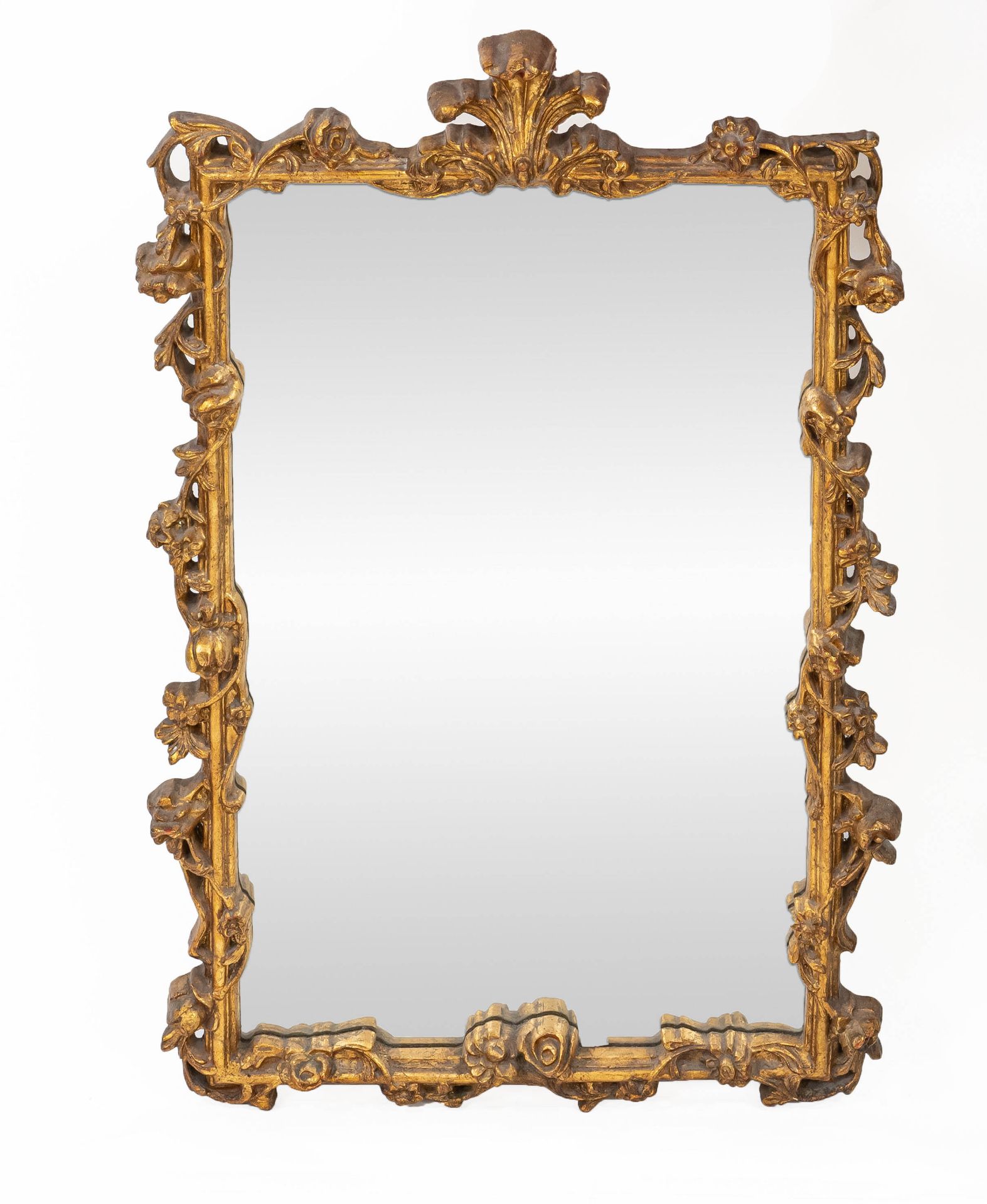 Baroque style wall mirror, 20th century, wood carved and gilded, 100 x 60 cm