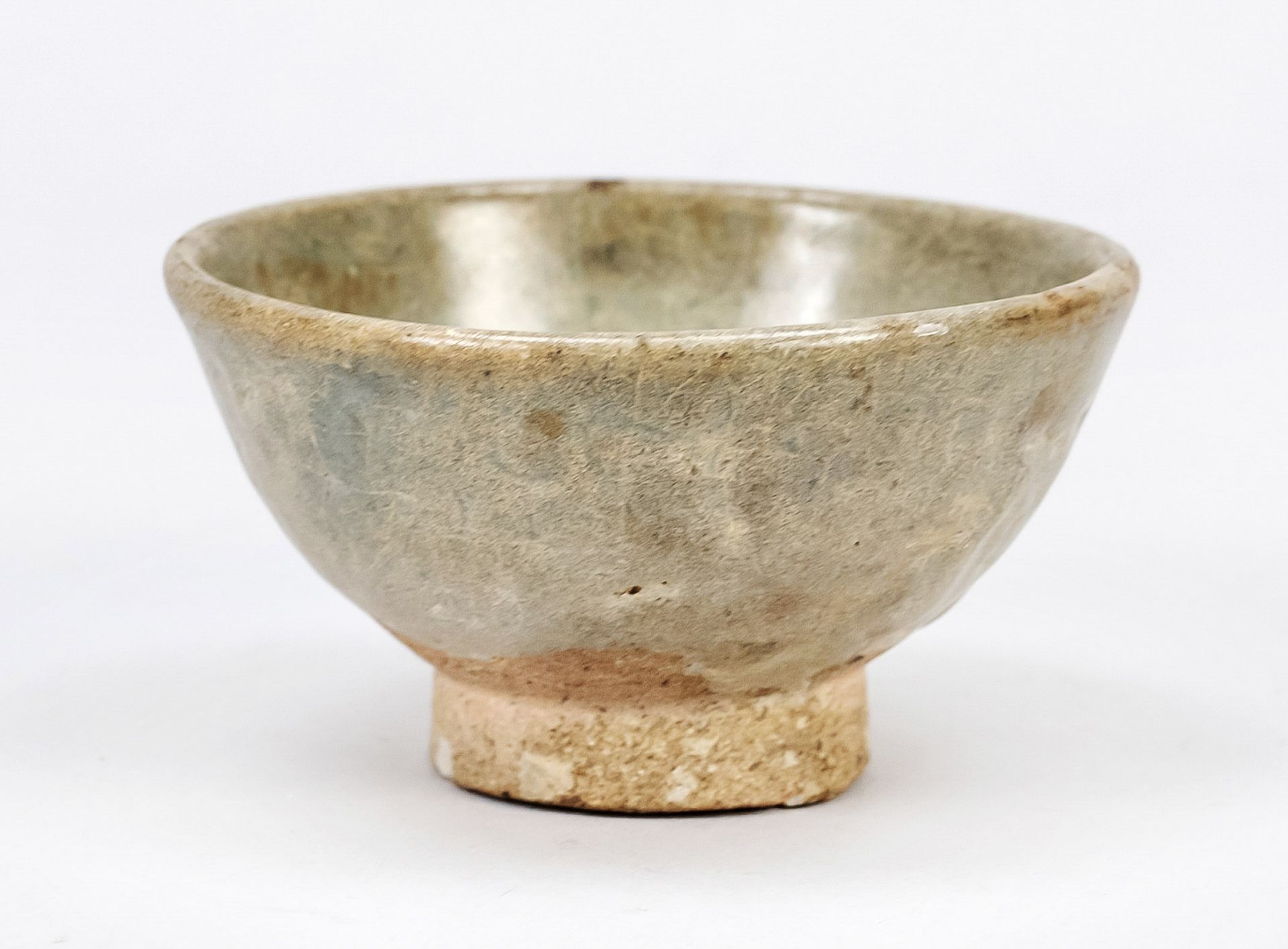 Seladon tea bowl, China, probably Song dynasty(960-1279), stoneware with stepped foot turned and