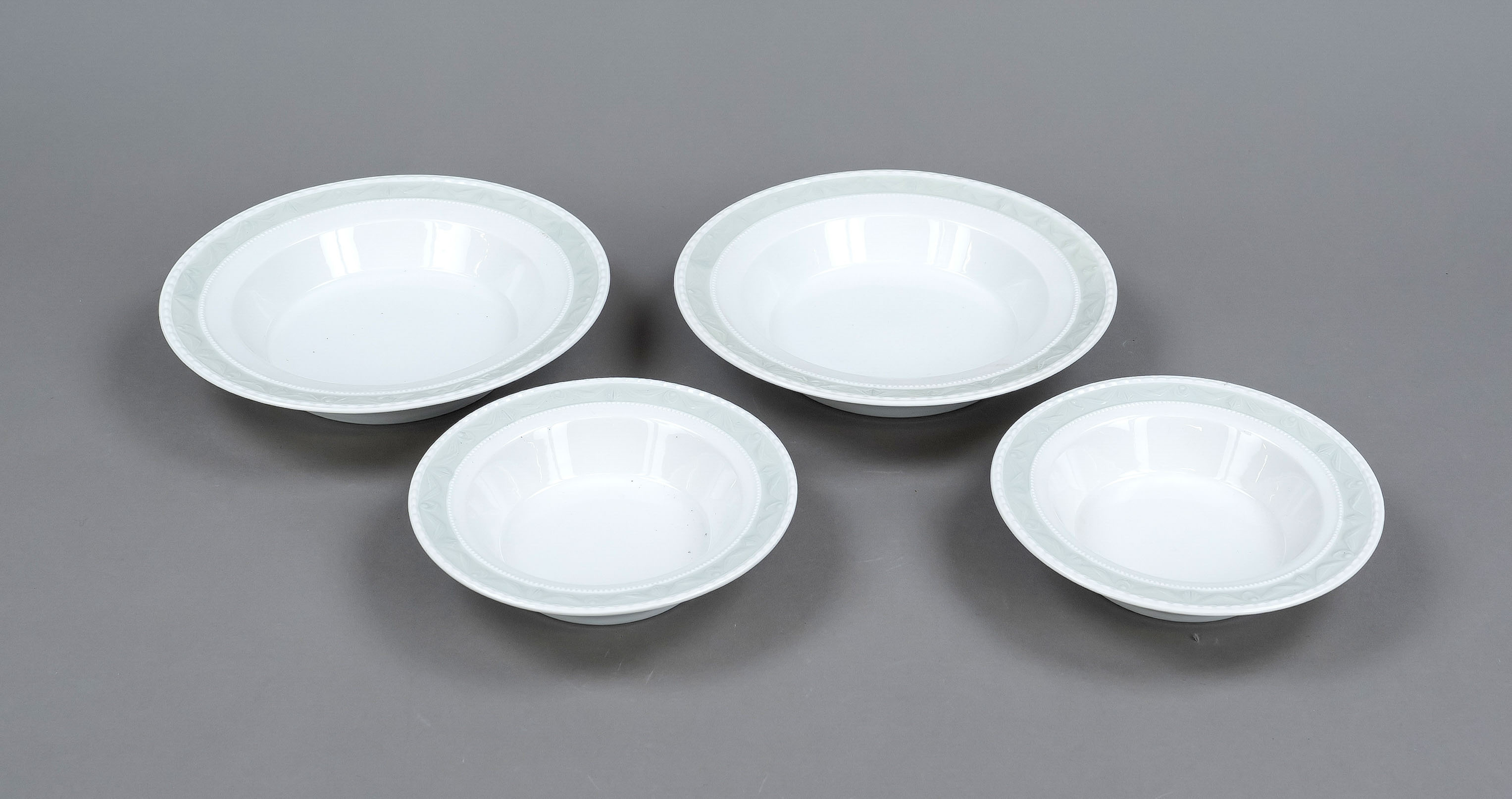 Four round bowls, KPM Berlin, 20th century,3rd choice form Kurland, design for the last duke of