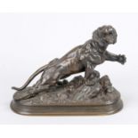 J. Hesteau, French animal sculptor early 20th c. snarling tiger with raised paw, brown patinated