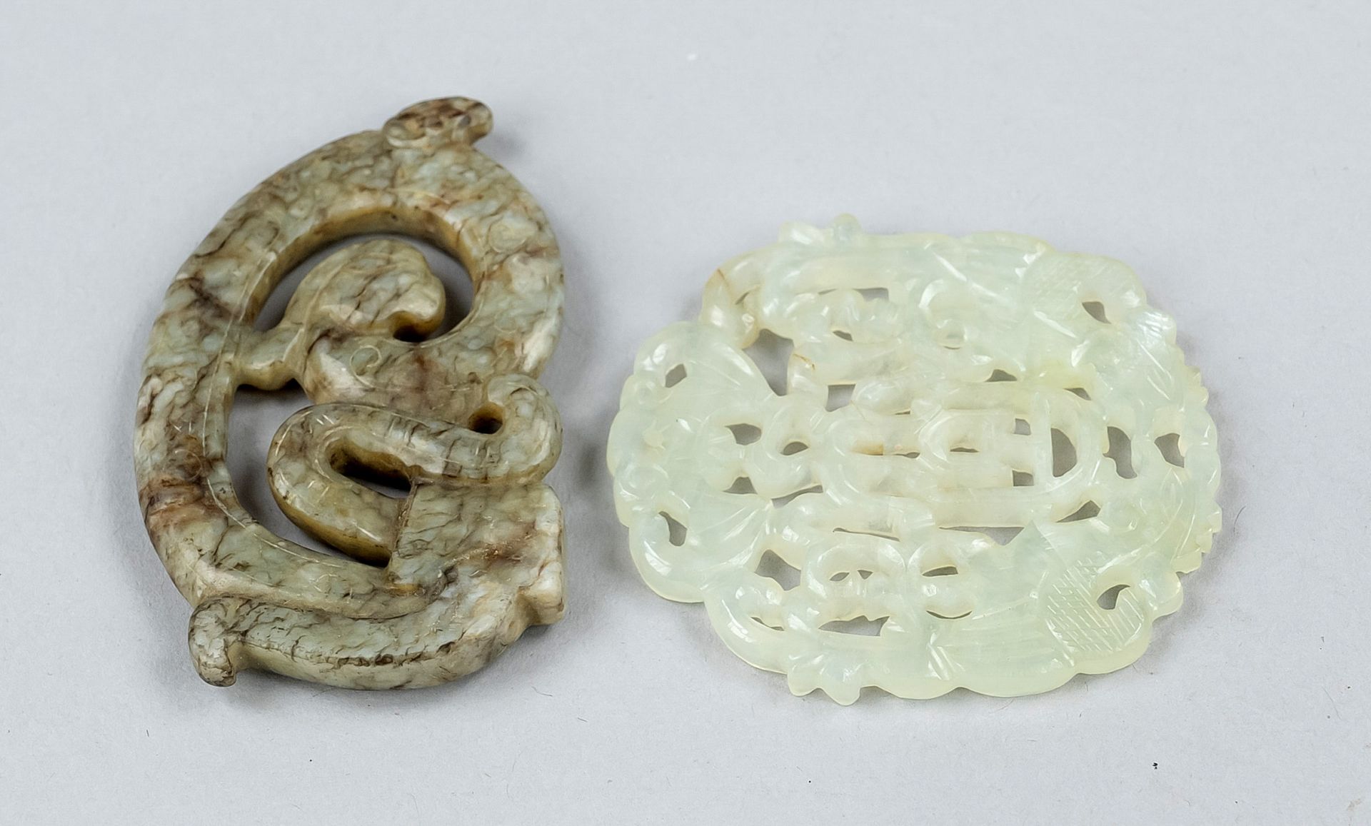 2 Jades, China, probably republic period(1912-1949), lime green jade with phoenix bat design and