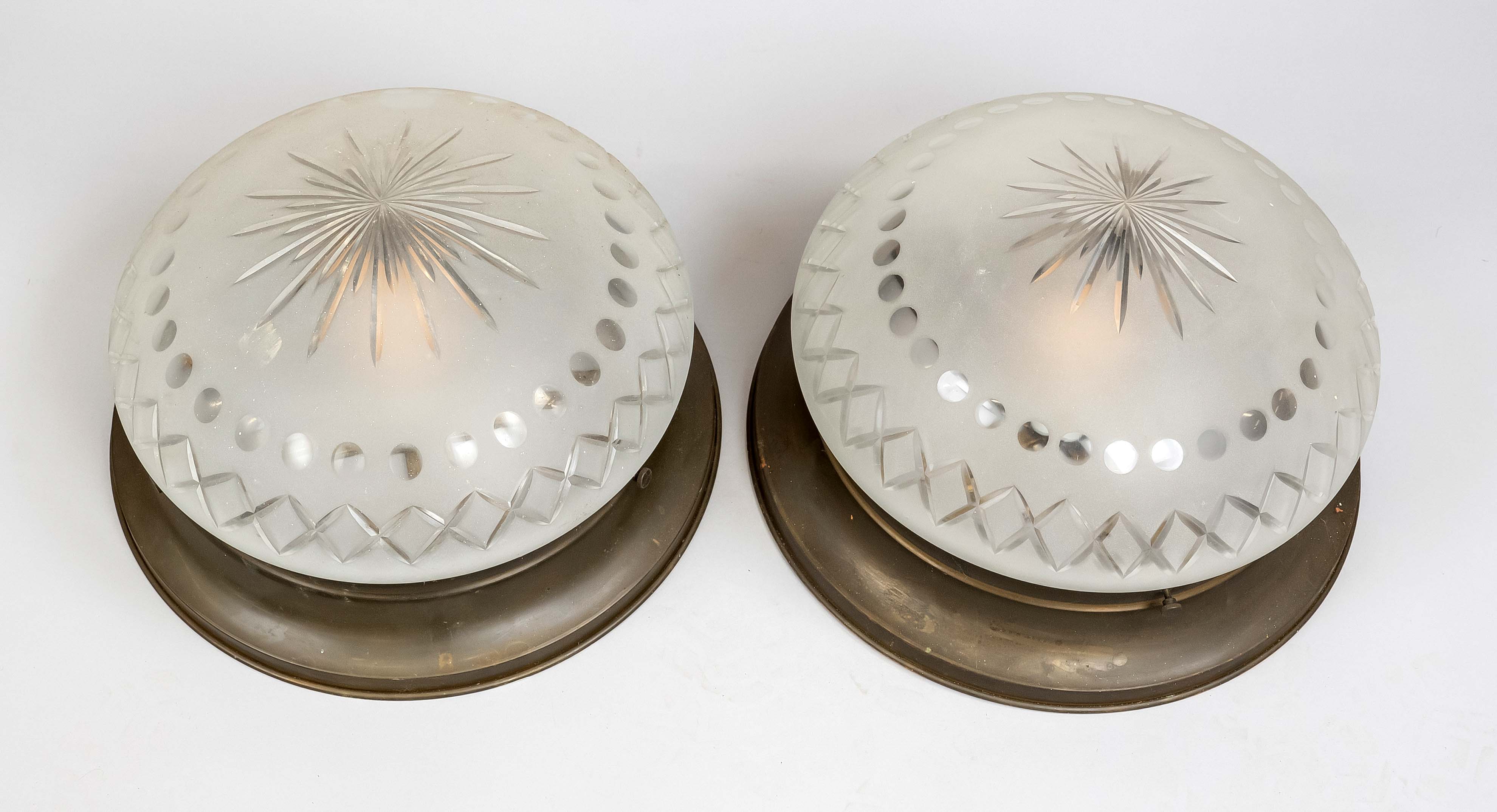 Pair of plafoniers, 20th c., profiled brass frame, etched glass shade with cut decoration, d. 38 cm