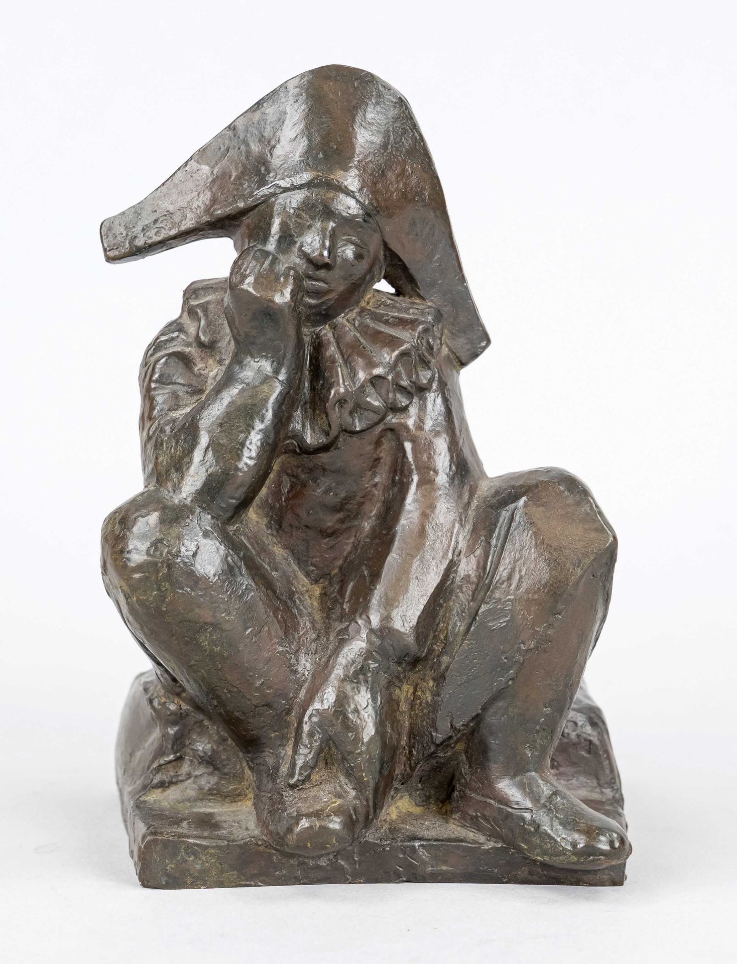 Robert Metzges (*1954), sitting harlequin, stylized figure in brown patinated bronze, unsigned,