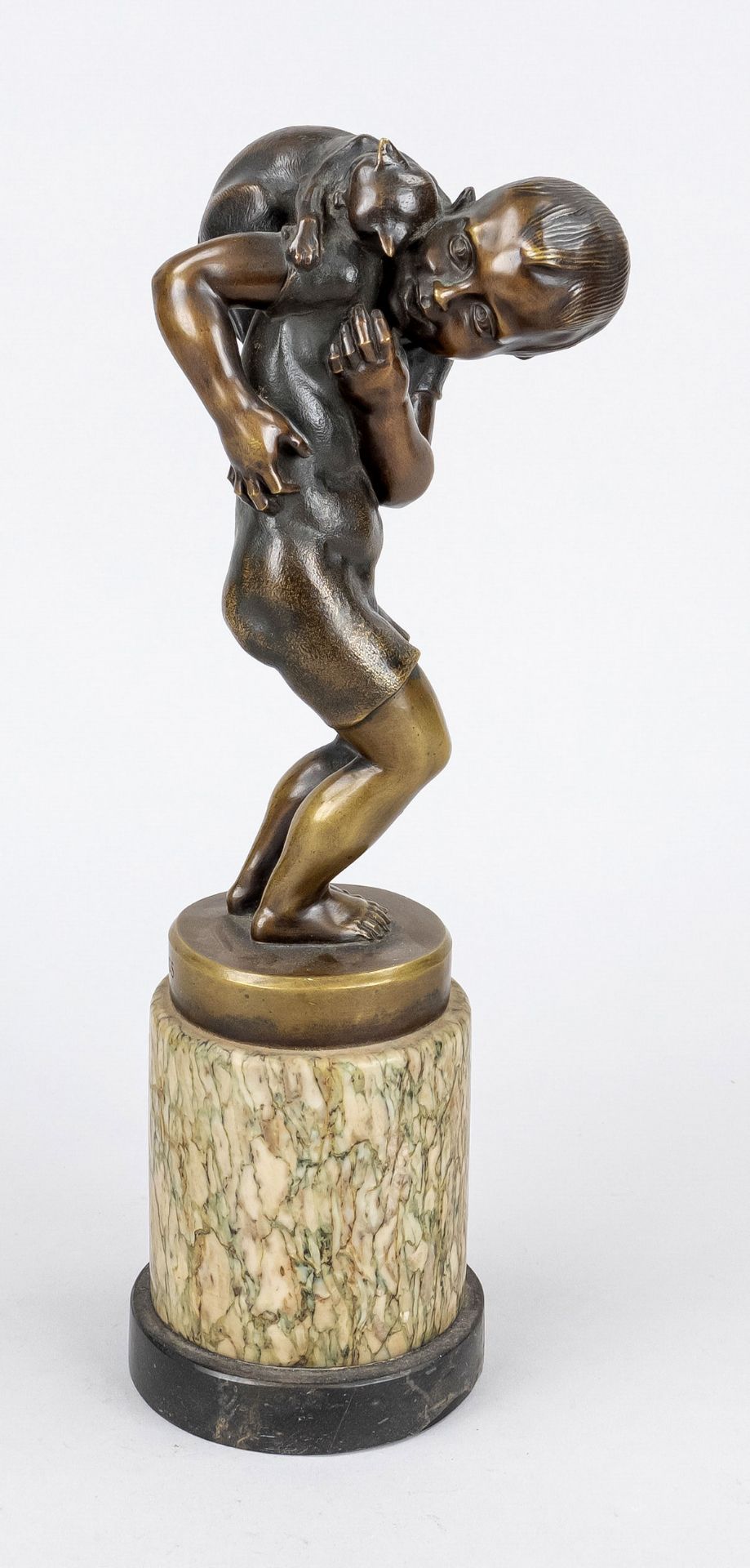 signed Stauss, German sculptor c. 1900, boy with cat on his back, patinated bronze on high marble