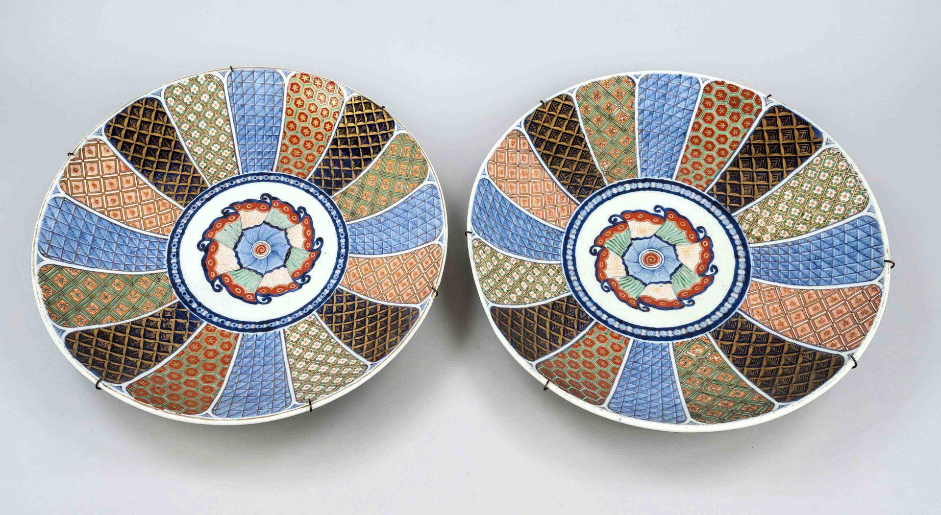 Pair of large Imari porcelain plates, Japan, Edo period(1603-1868), c. 1800, porcelain with