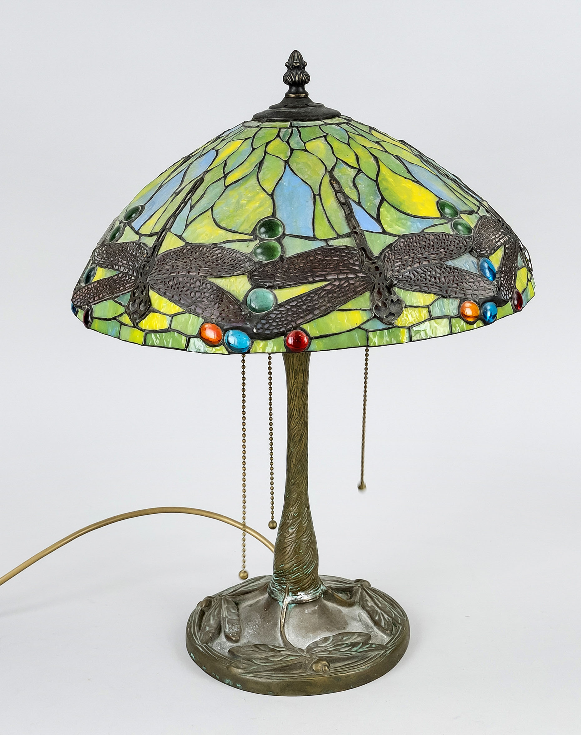 Lamp Tiffany style, probably France, 20th c., bronze base with dragonfly decoration, green dragonfly