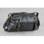 Loewe, Vintage Weekender, extremely soft, very fine black leather, partly with decorative stitching,