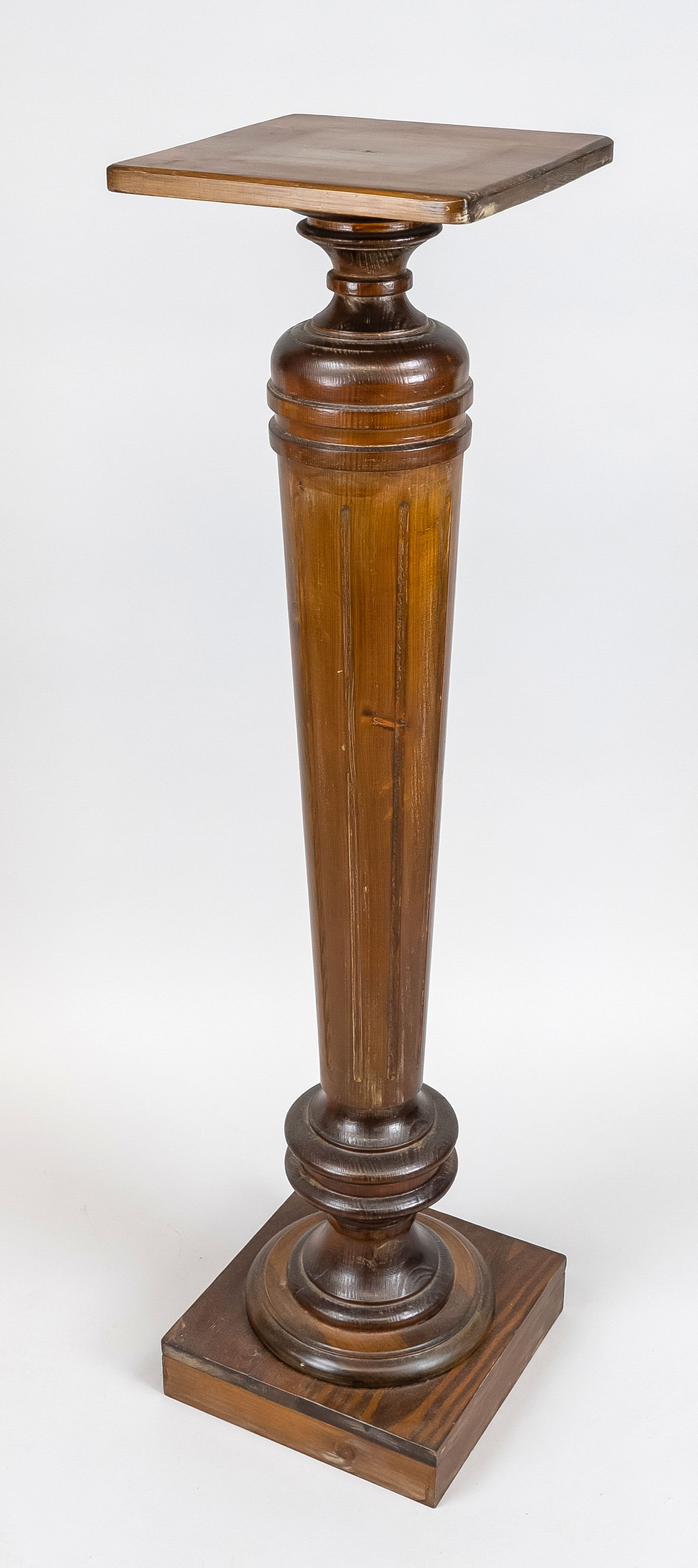 Flower column, late 19th century, darkened wood. Profiled base on square pedestal, fluted shaft,