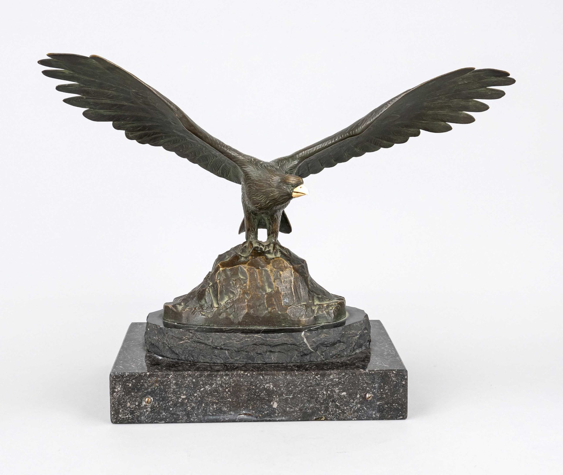 Otto Poertzel (1876-1963), large eagle, model on rock with impressively spread wings, golden brown