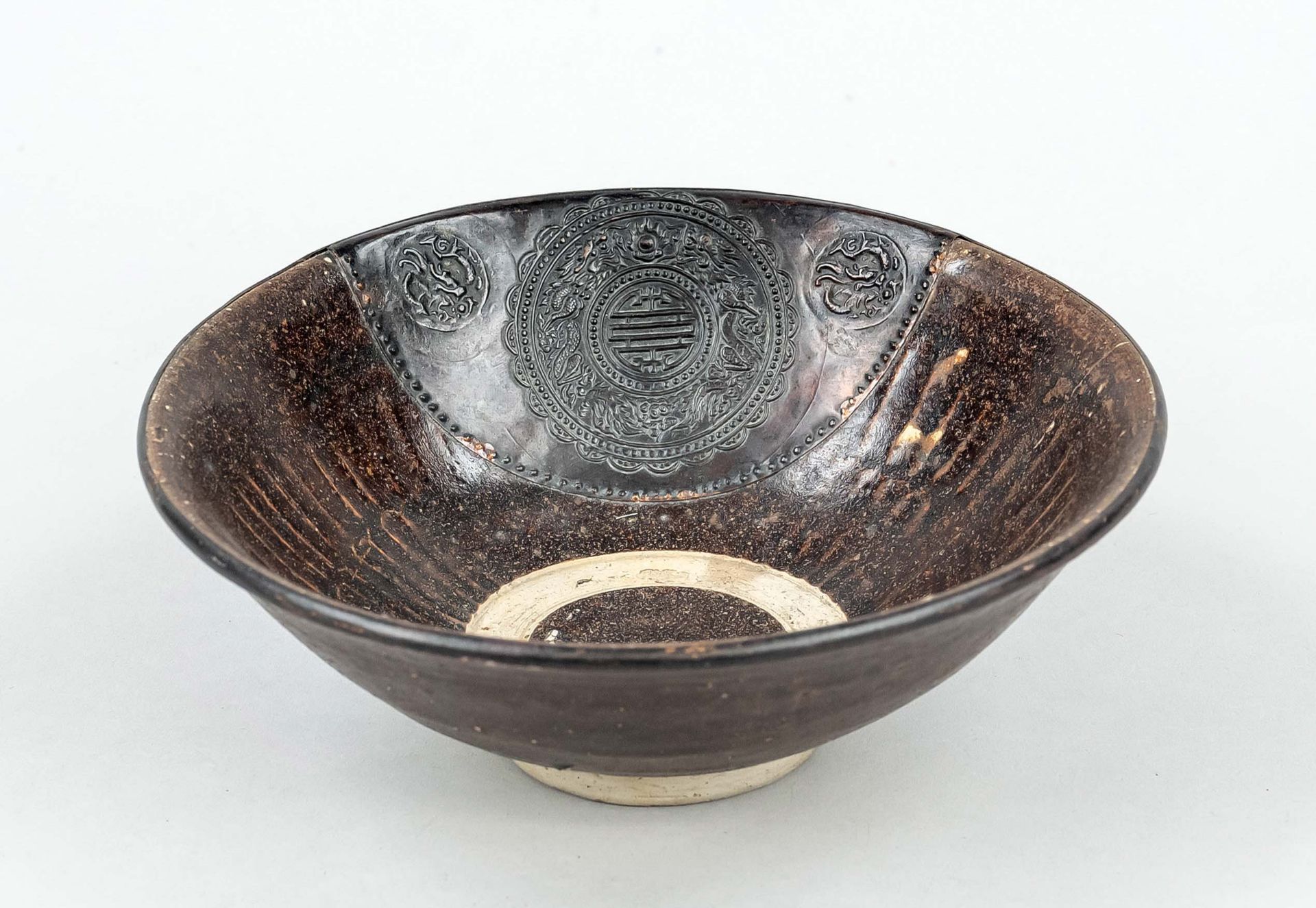 Rare brown glazed bowl with historic repair, China, Qing dynasty(1644-1911), 18th c. stoneware