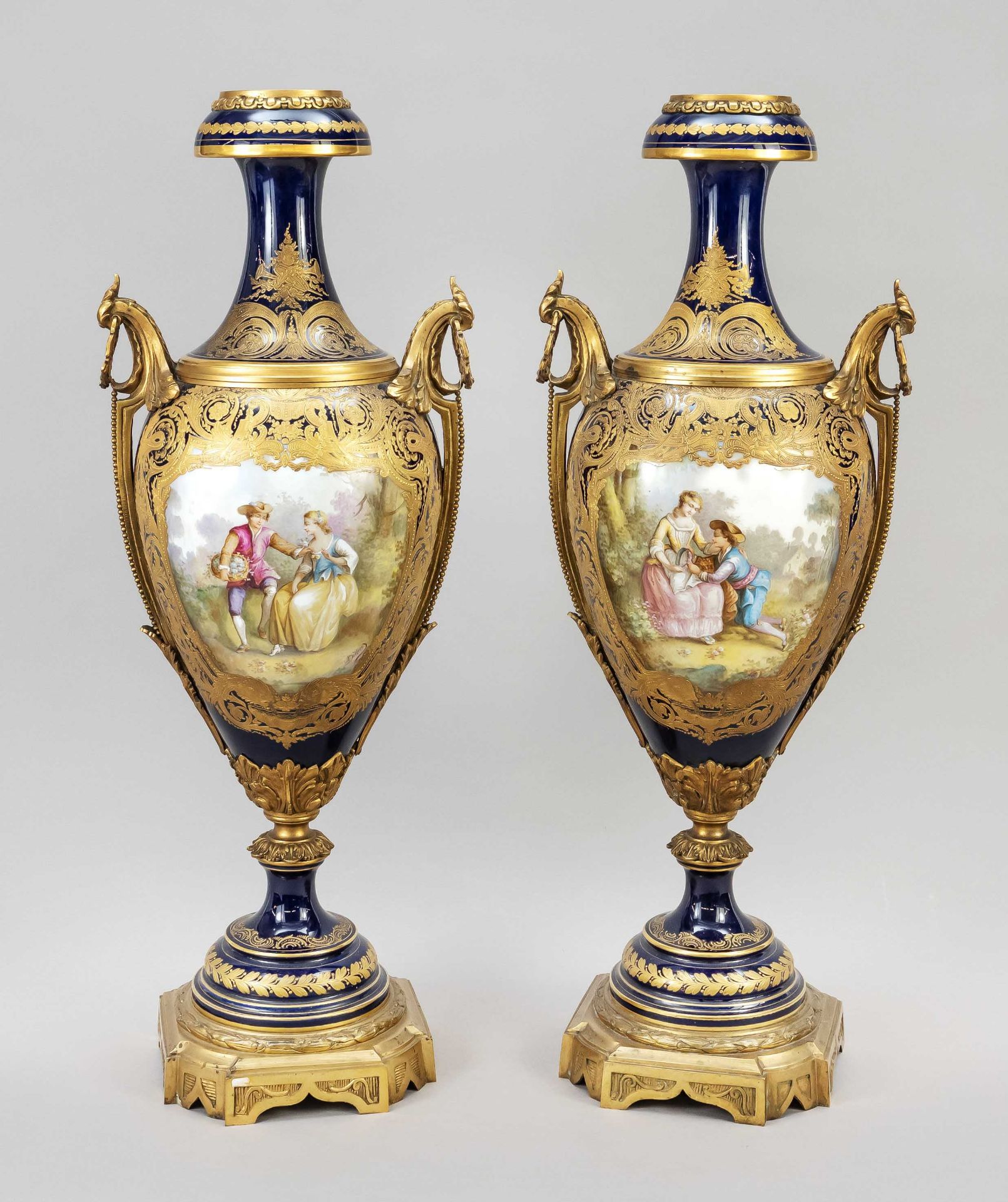 Pair of Sevres style vases, France, 19th c., oval body on round stand, splendid brass mounting,