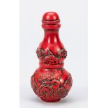 Snuff Bottle ''The Pair of Cranes of Pine Peak'', China, c. 1900, carved red lacquer with decoration