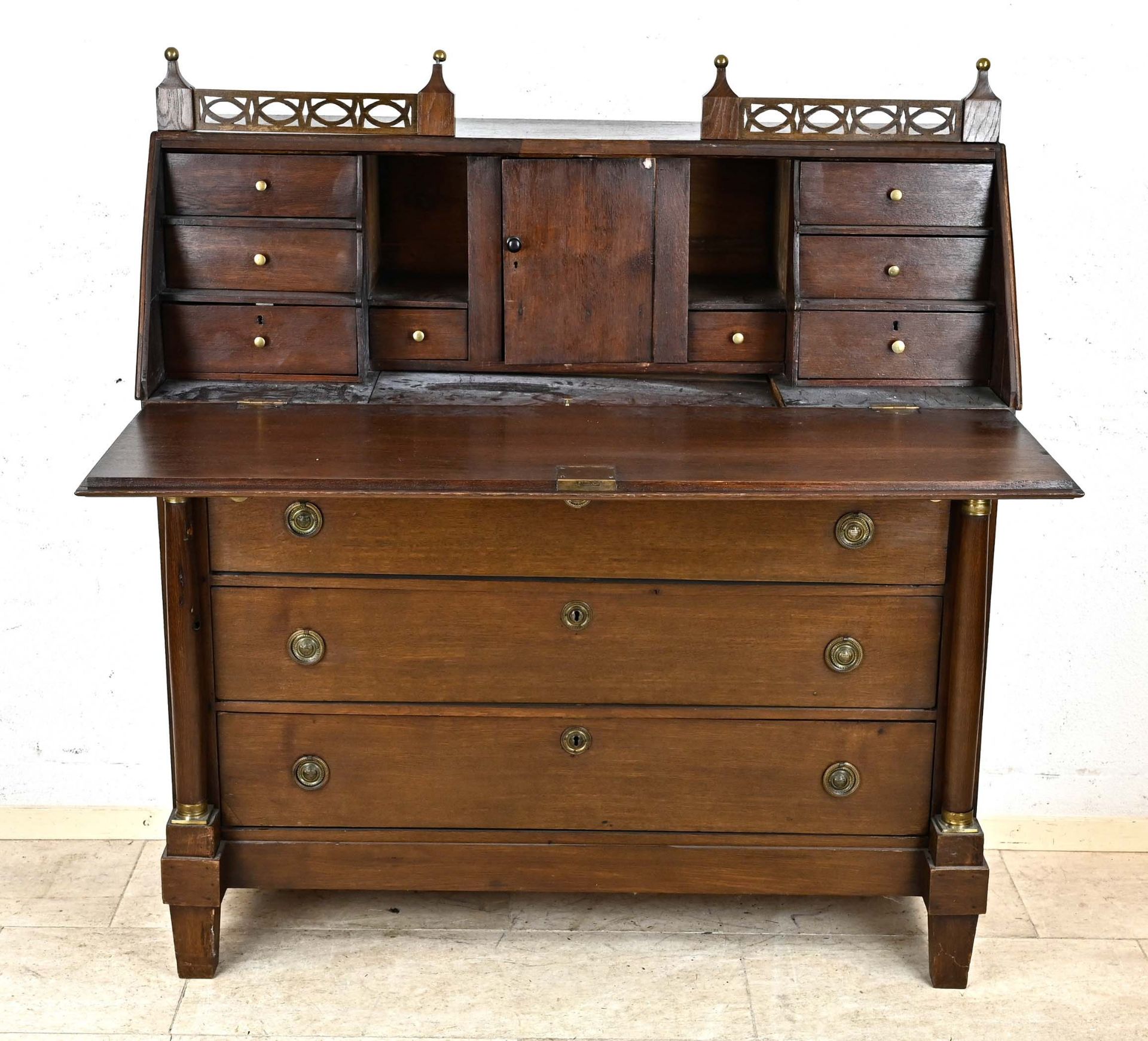 Empire secretary around 1810, oak, straight 3-bay corpus flanked by solid columns, brass fittings,