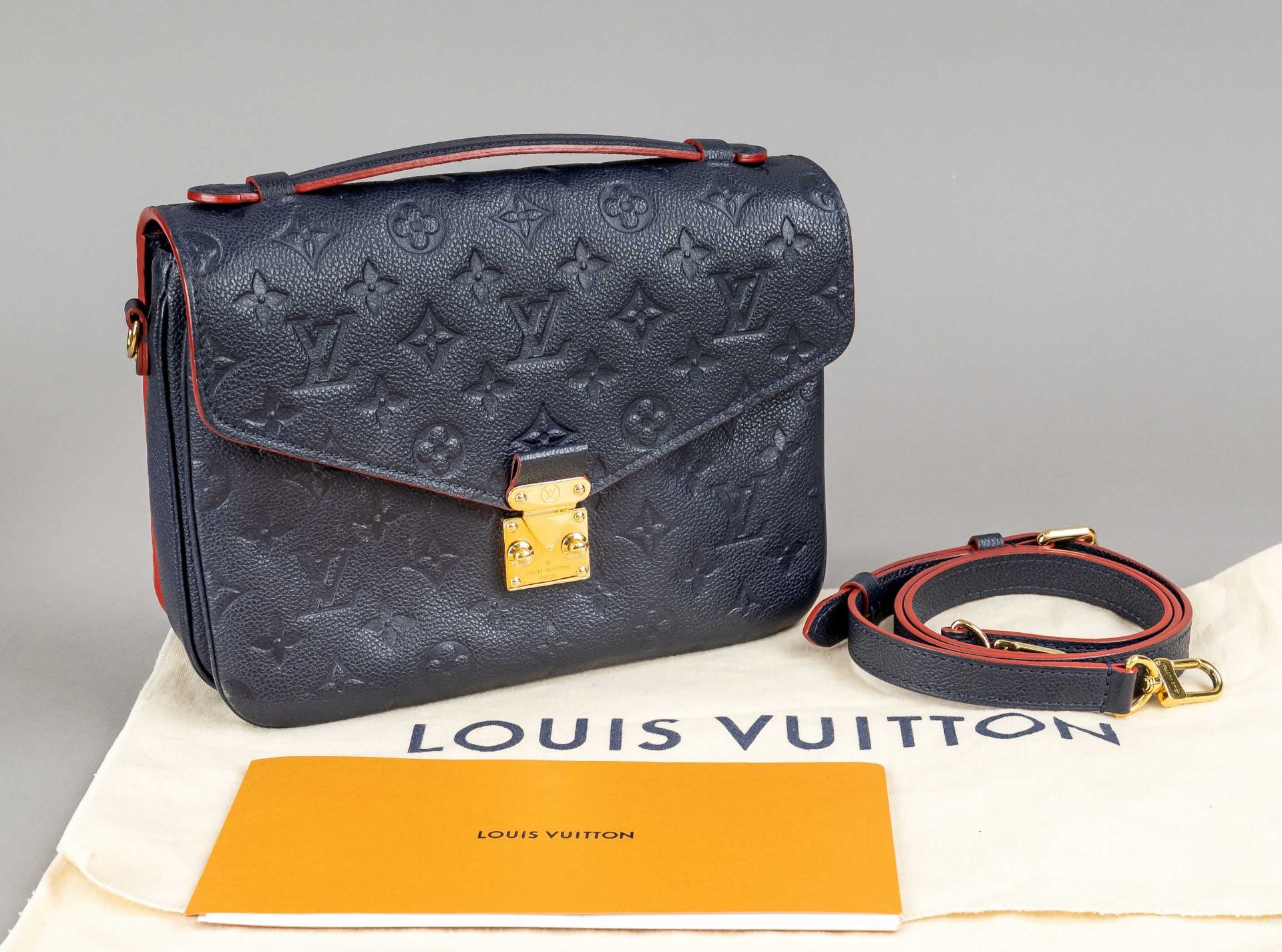 Louis Vuitton, Marine Rouge Pochette Metis Monogram Empreinte Bag, navy grained leather with