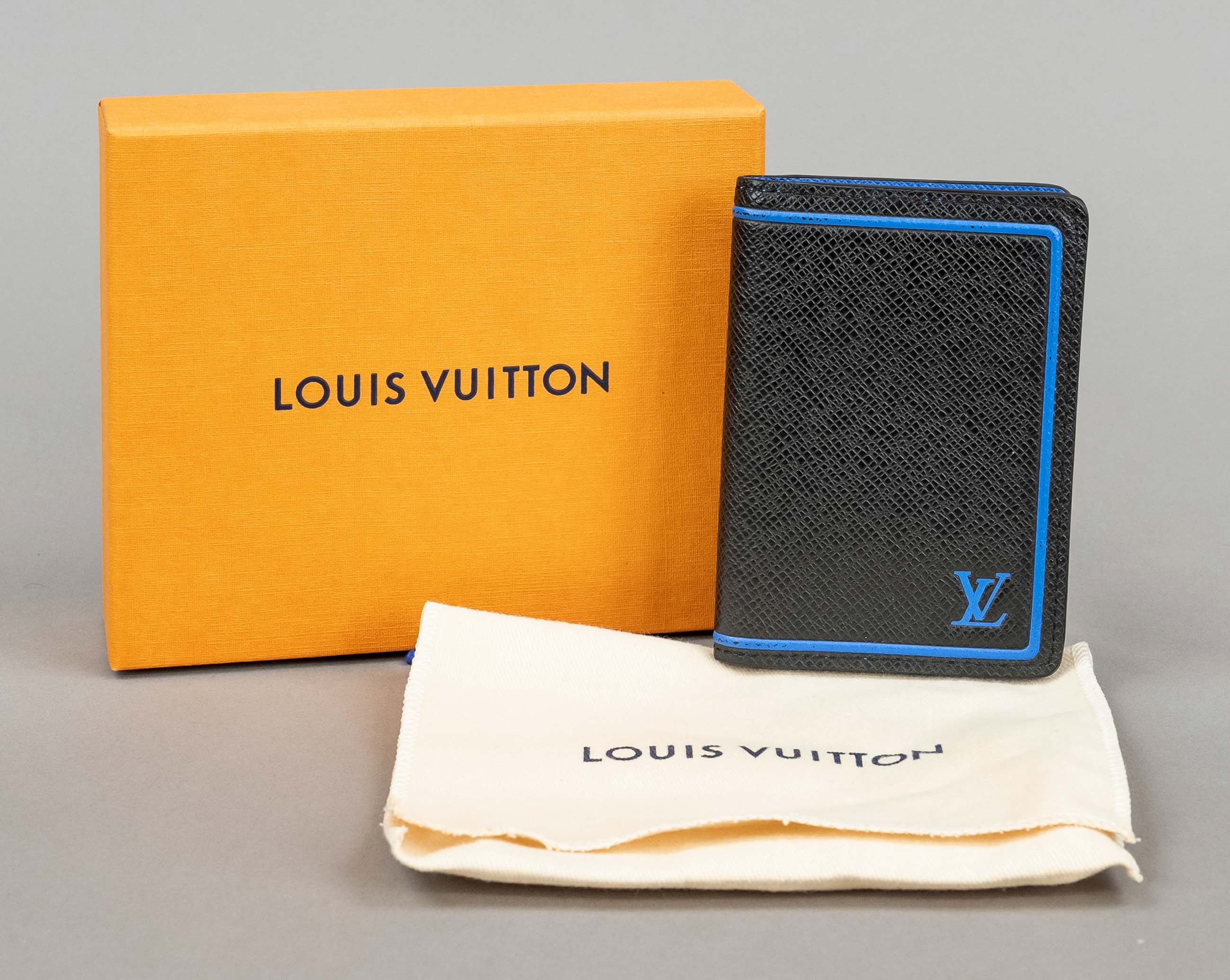 Louis Vuitton, card case, dark grey textured leather, set off with royal blue trim and embossed