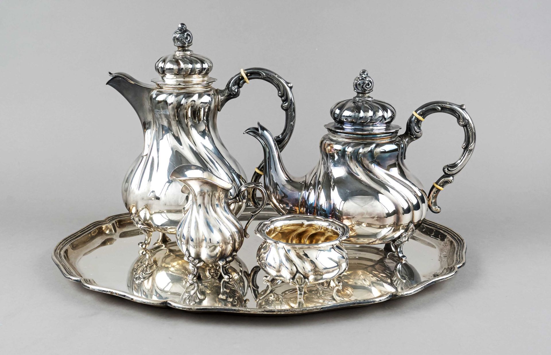 Four-piece coffee and tea centerpiece on oval tray, German, 20th c., maker's marks Hermann Behrnd,