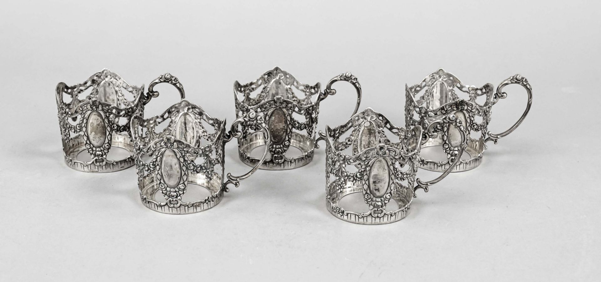 Five tea glass holders, German, 20th c., Adam Manns & Sohn, Dörnigheim, silver 800/000, round stand,