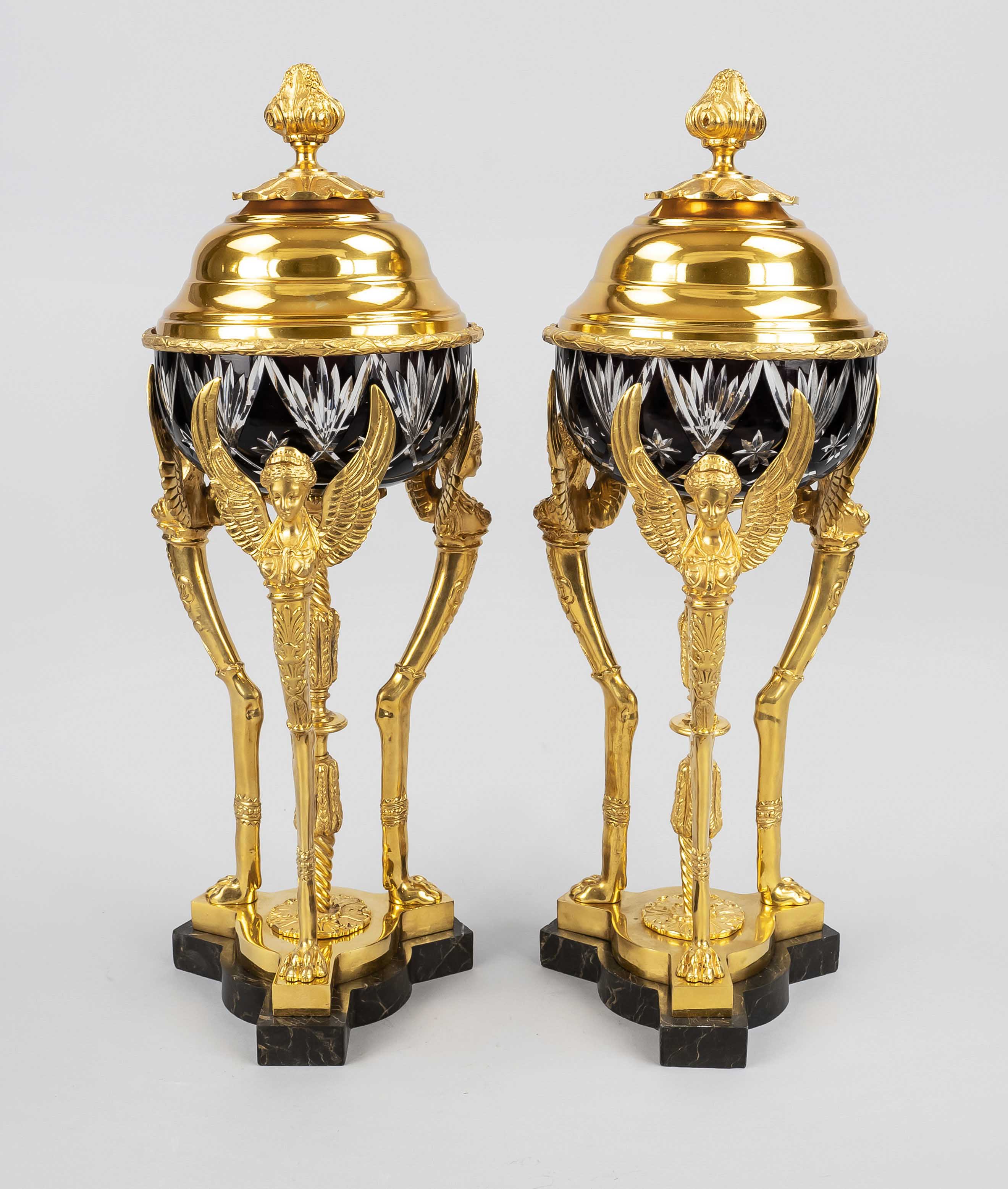 Pair of large coupes/table centerpieces, 20th c., bronze gilded, brass, ruby glass with cut