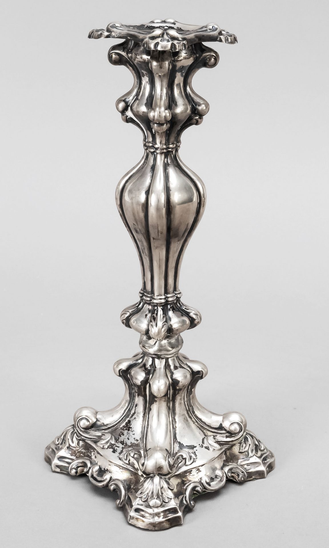 Candlestick, c. 1900, silver tested, matching curved square stand, baluster stem, spout in vase form