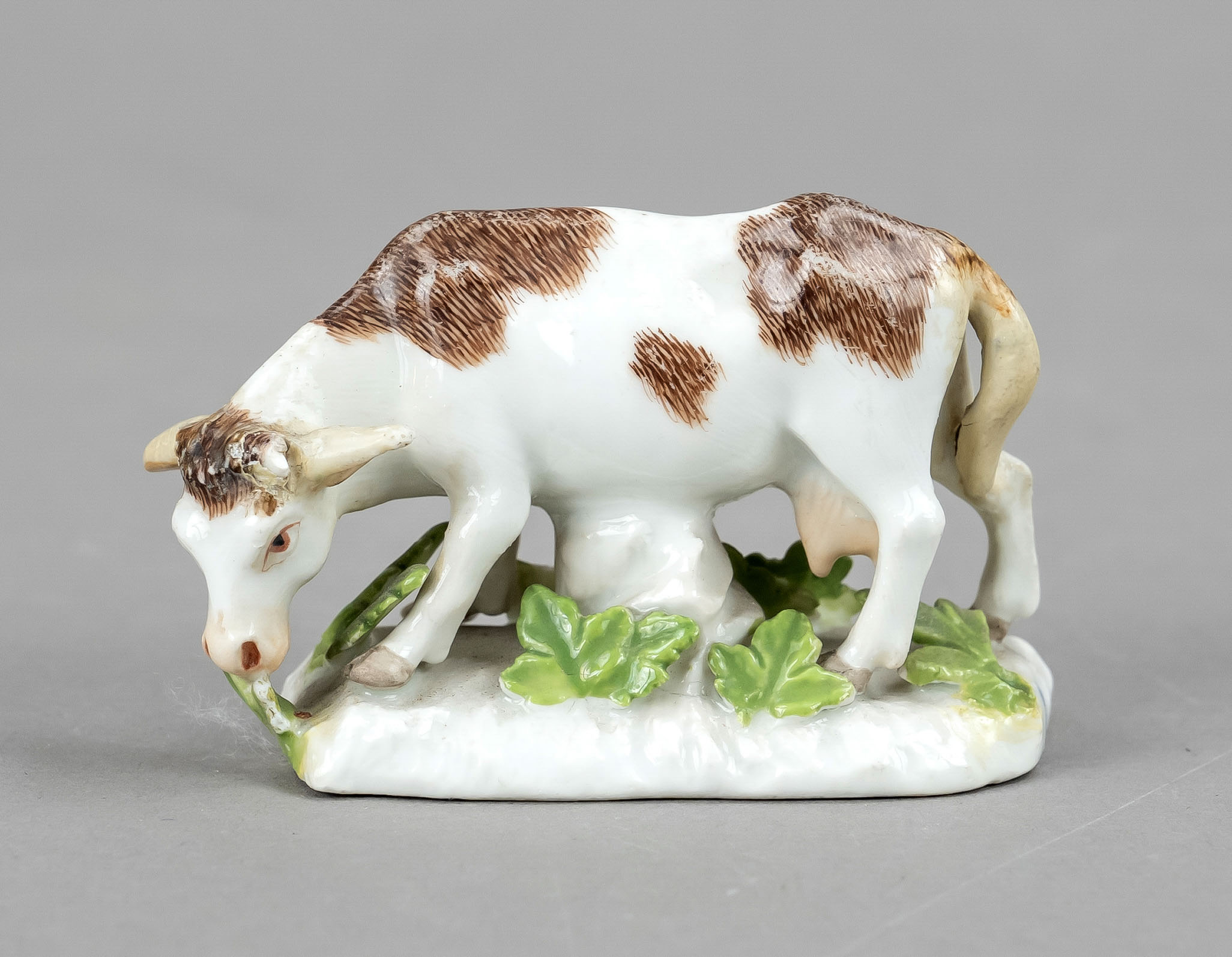 Grazing miniature cow, Meissen, 18th century, designed by Johann Joachim Kaendler (1706 Dresden -