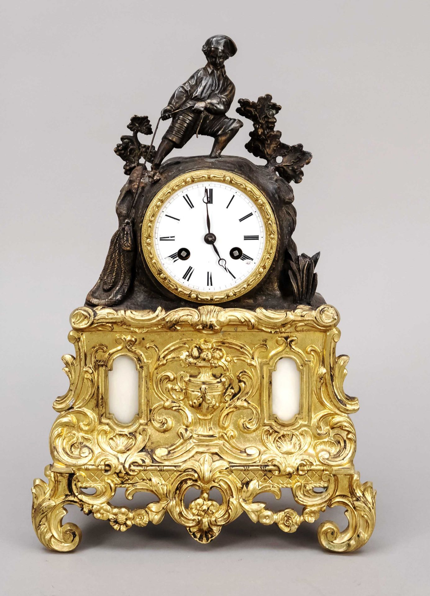 french. Pendulum, 1st half 19th c., gilded decorated with rocailles and floral motifs, in the center